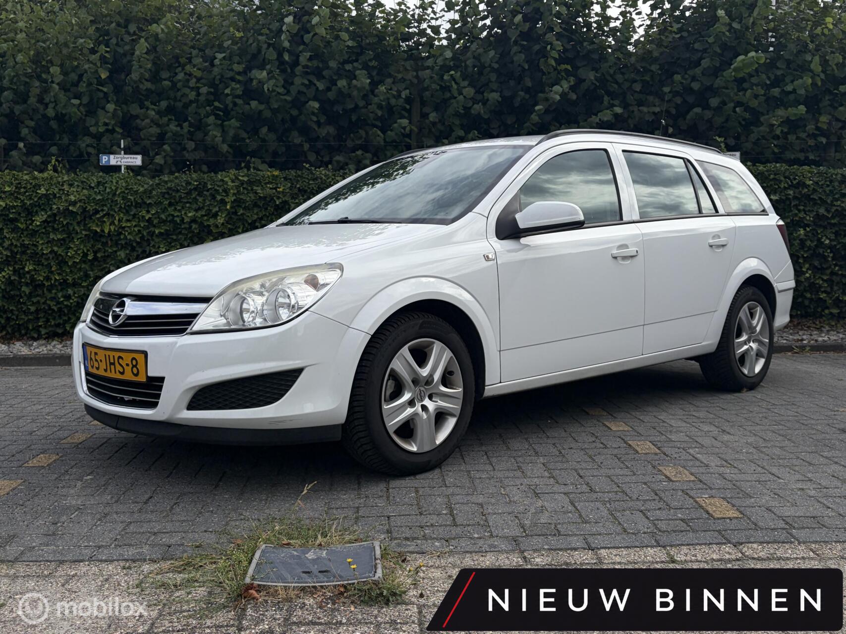 Opel Astra Station Wagon 1.6 Business INRUILKOOPJE / AIRCO / CDV / GOED ONDERHOUDEN! / 2009 - voorkant