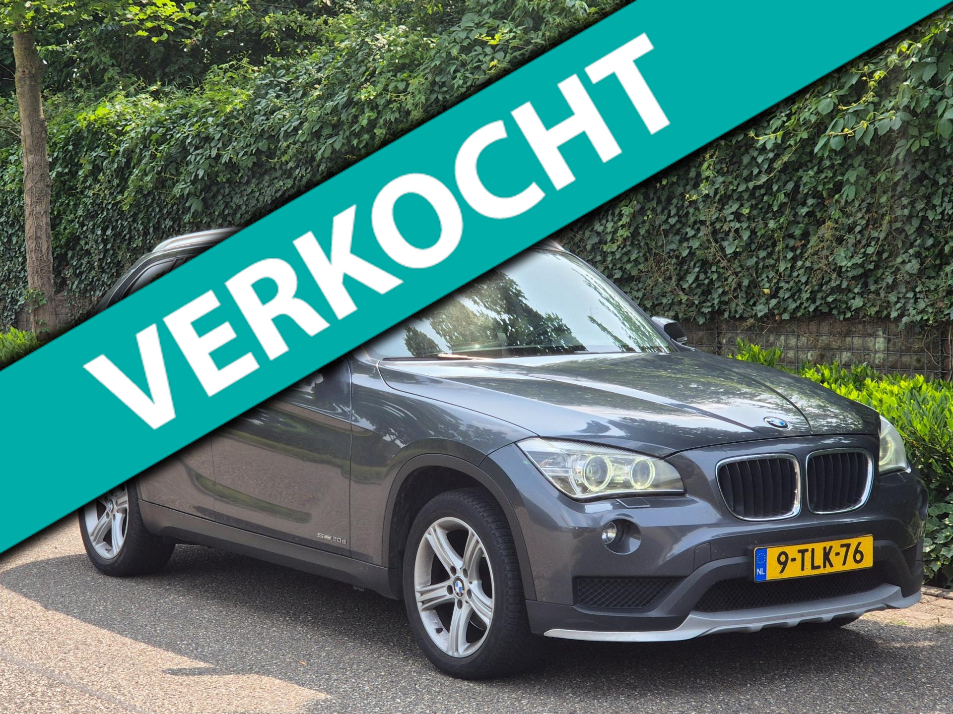 BMW X1 SDrive 20d Executive Navigatie Automaat Trekhaak Cruise Control Diesel NAP NL APK 2014 - voorkant