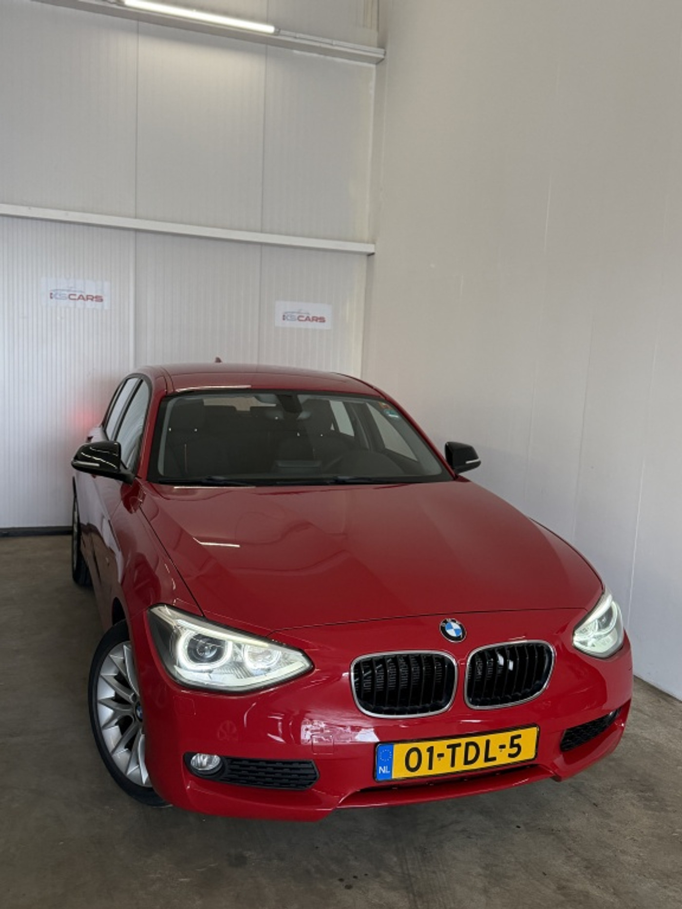 BMW 1er Reihe 116i Business+ 2012 - voorkant