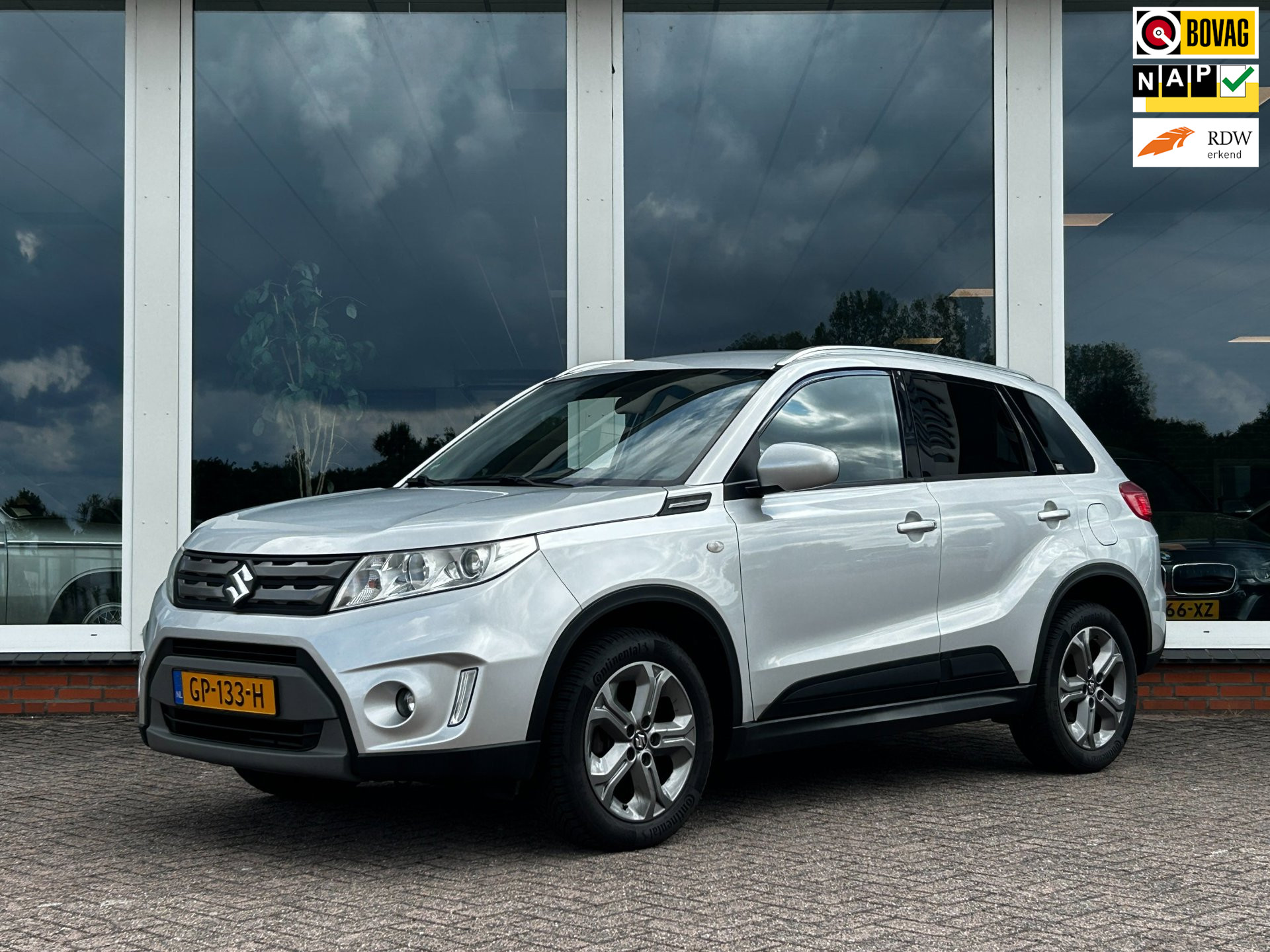 Suzuki Vitara 1.6 Exclusive - Navi - Camera - Trekhaak - LM 2015 - voorkant