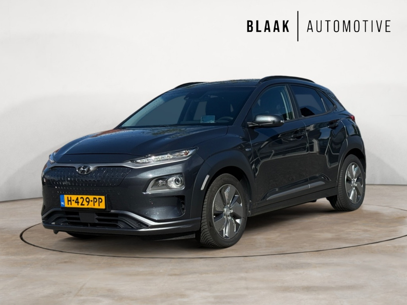 Hyundai Kona EV Premium 64 kWh BTW auto | 1e eigenaar | Apple/Android | Navi | Camera 2020 - voorkant