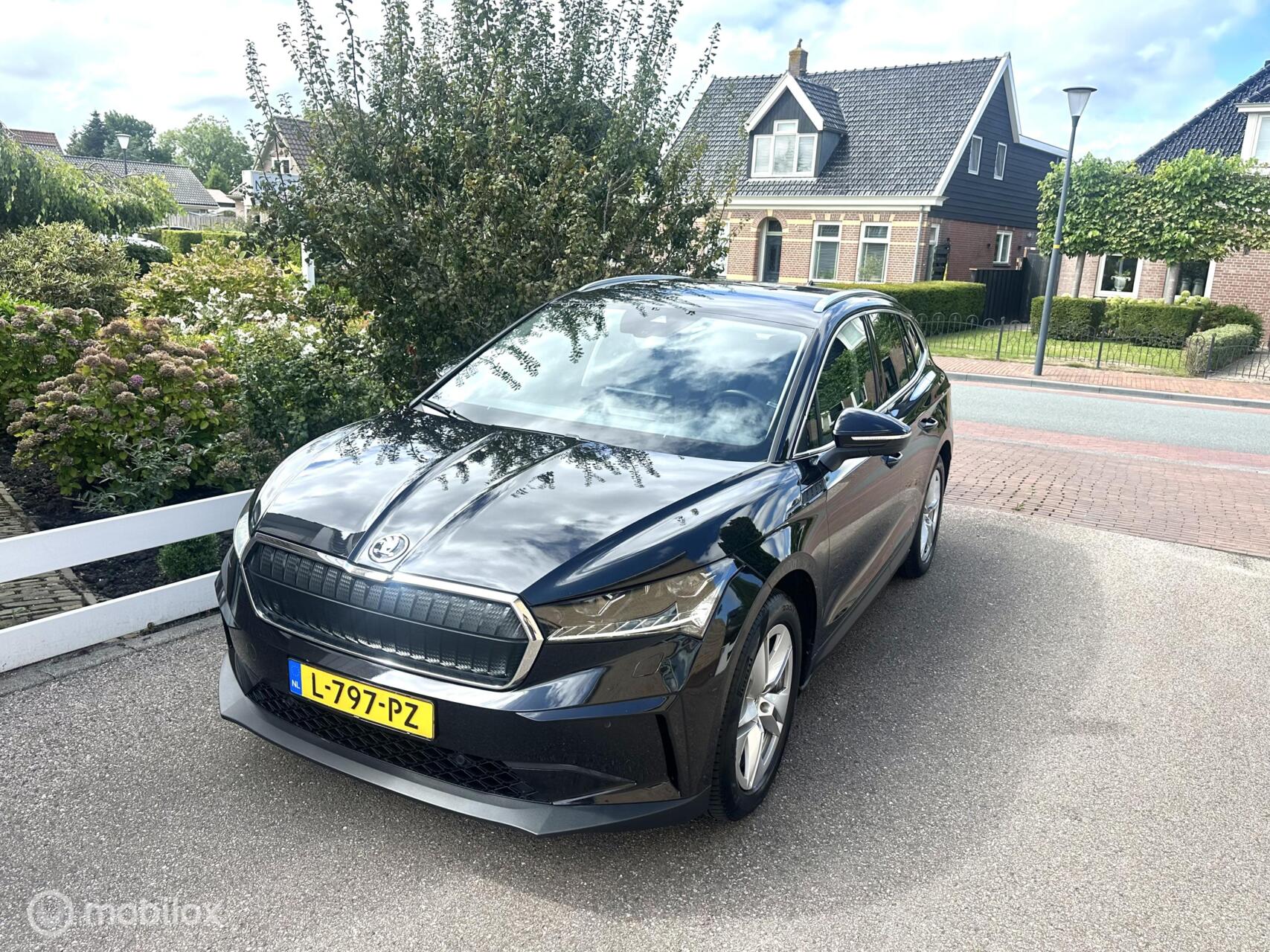 Skoda Enyaq 80 80  SOH 92% CARPLAY WEGKLAPBARE TREKHAAK STUURVERWARMING SFEERVERLICHTING ACHTERUITRIJ CAMERA GROTE ACCU!! 2021 - voorkant