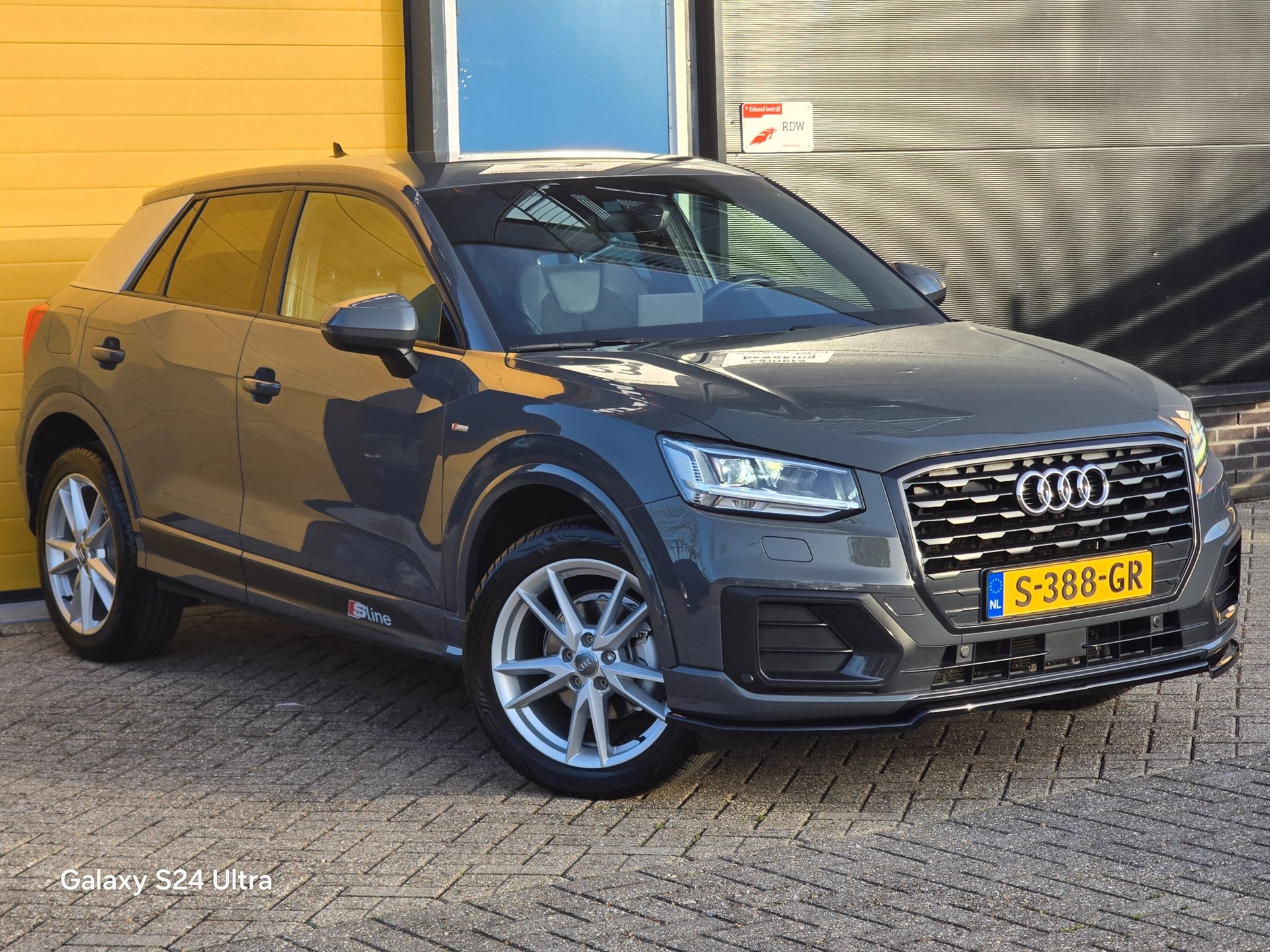 Audi Q2 35 TFSI S Line / Aut / 150 PK / TOPSTAAT / Navi / Ecc / Elek Pakket / Cruise Control / Led / Pdc / Allu Velgen 2019 - voorkant