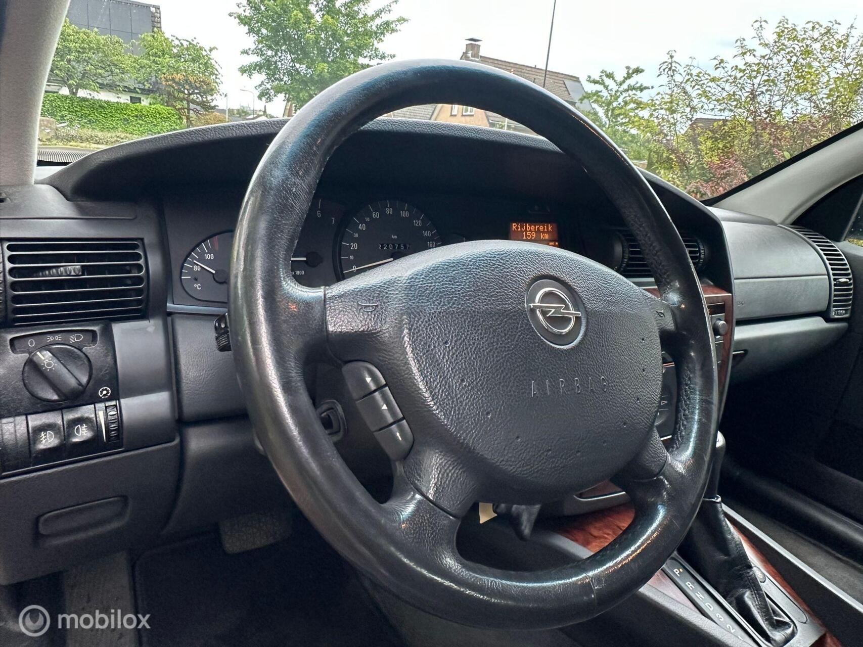 Foto van Opel Omega-b