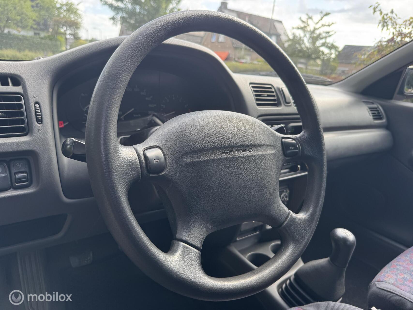 Foto van Mazda Mazda 323