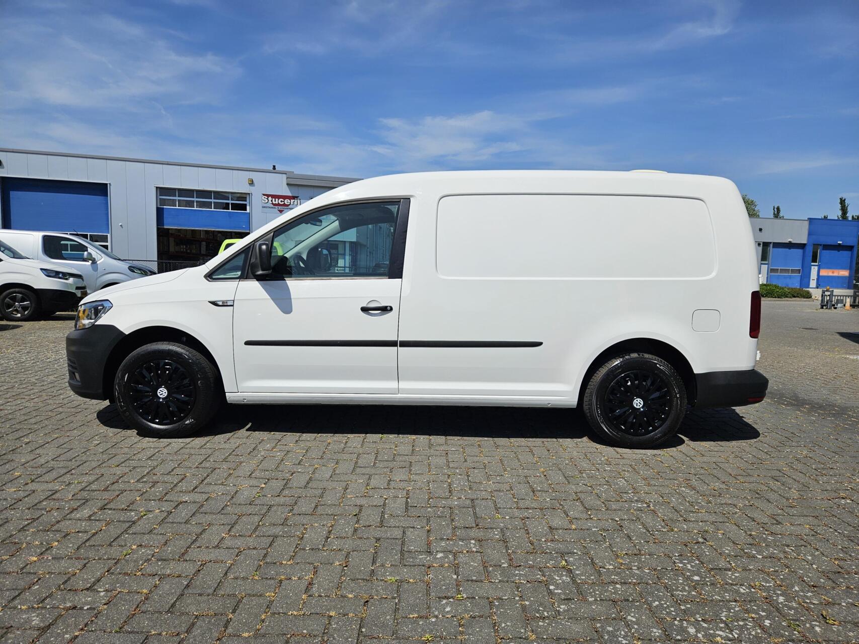 Foto van Volkswagen Caddy Modified Partition Wall