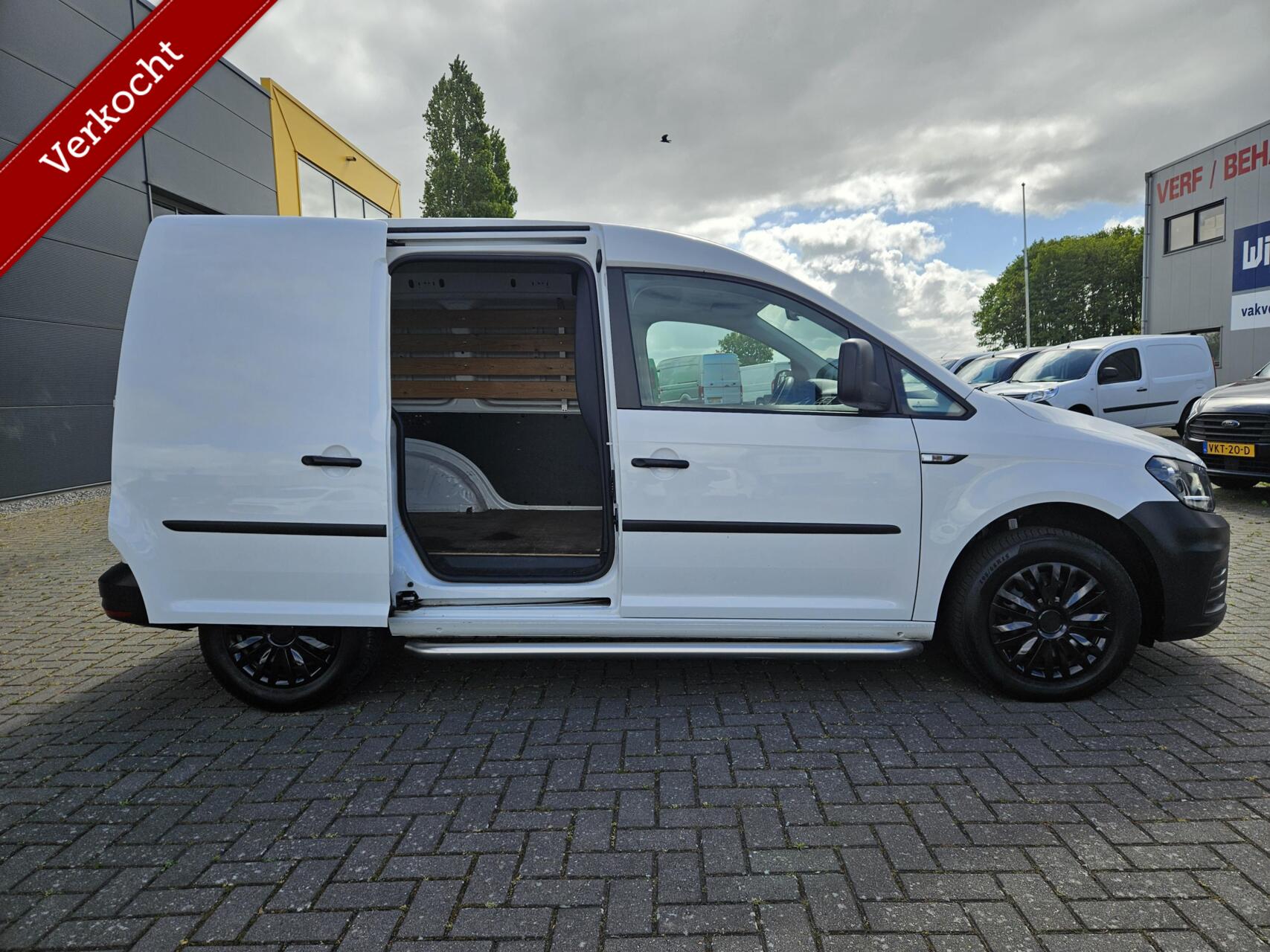Foto van Volkswagen Caddy Modified Partition Wall