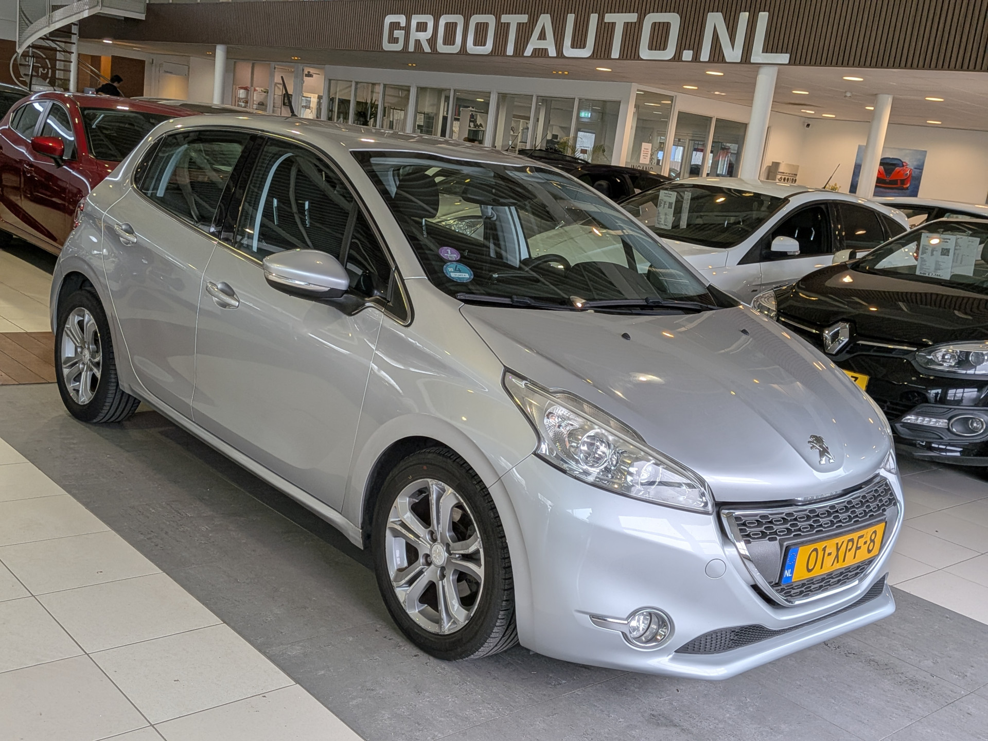 Peugeot 208 1.4 VTi Allure 2012 - voorkant