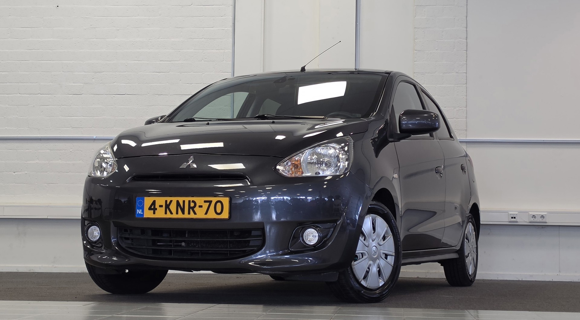 Mitsubishi Mitsubishi Space Star 1.2i Invite Automaat APK 02-08-2027 Parkeerhulp 3e Eigenaar 2013 - voorkant