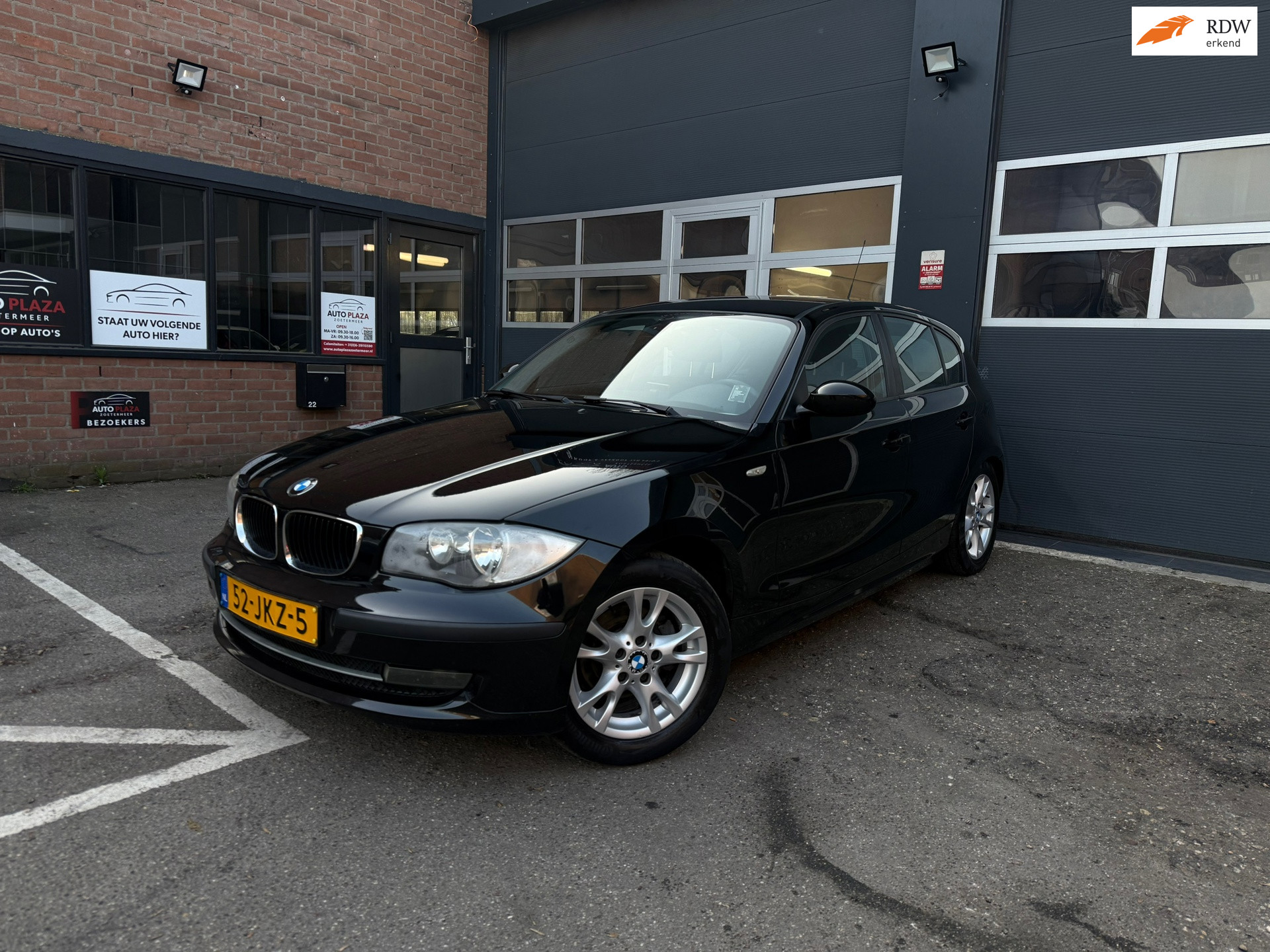 BMW 1er Reihe 116i Business Line 2009 - voorkant