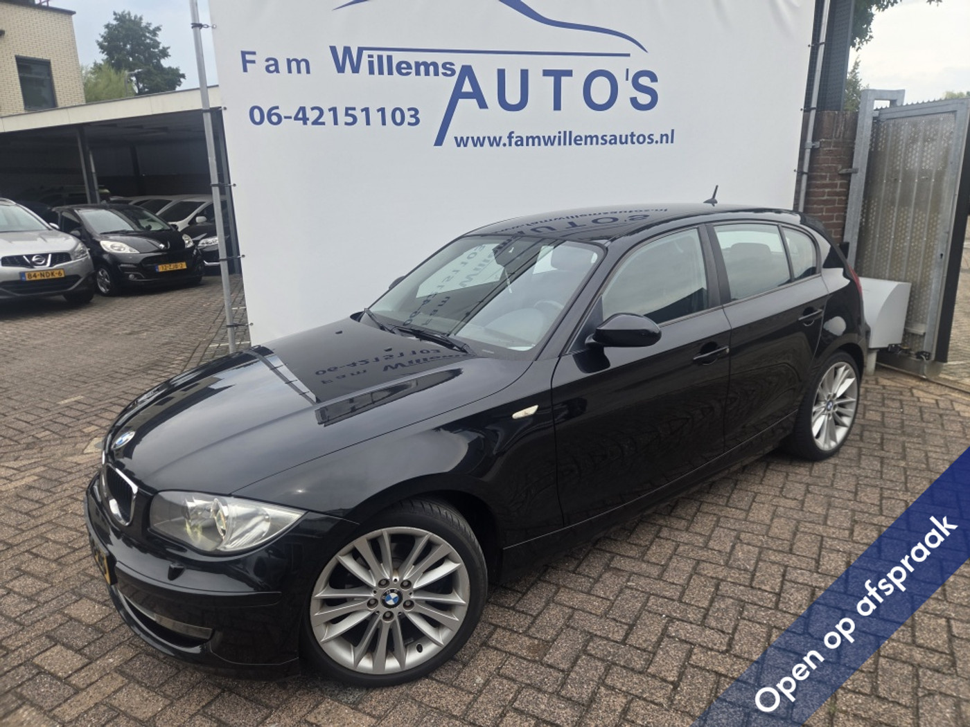 BMW 1er Reihe 116i Business Line 2009 - voorkant