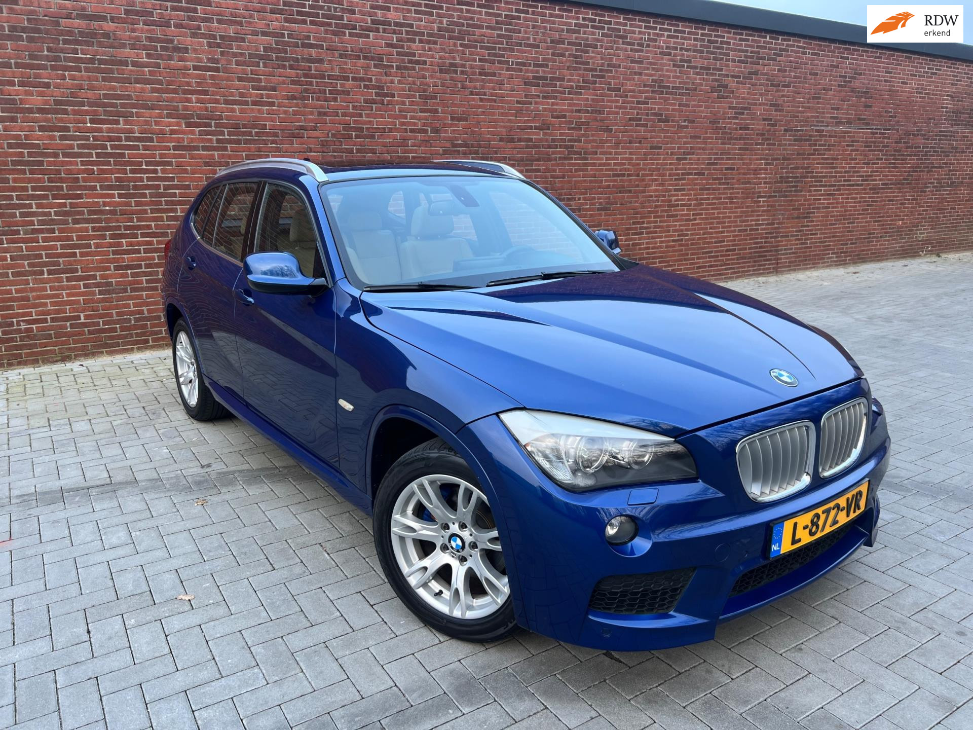 BMW X1 Xdrive20i XDrive20i Business M SPORT|PANO |1STE EIGENAAR |CARPLAY |TREKHAAK 2012 - voorkant