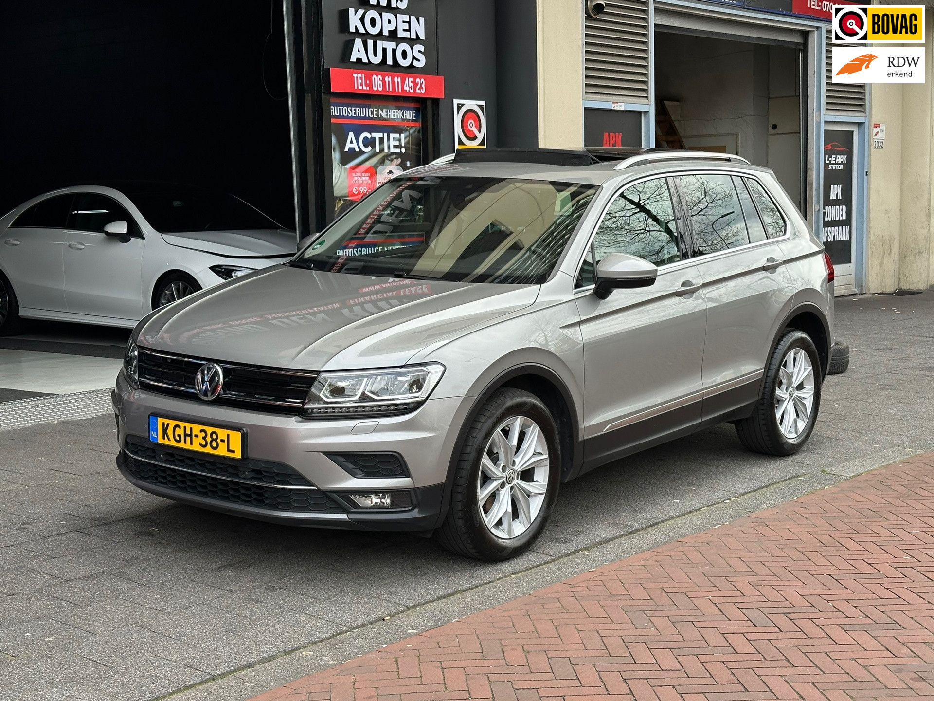 Volkswagen Tiguan 1.4 TSI 4Motion Highline Navi Carplay Pano 2017 - voorkant