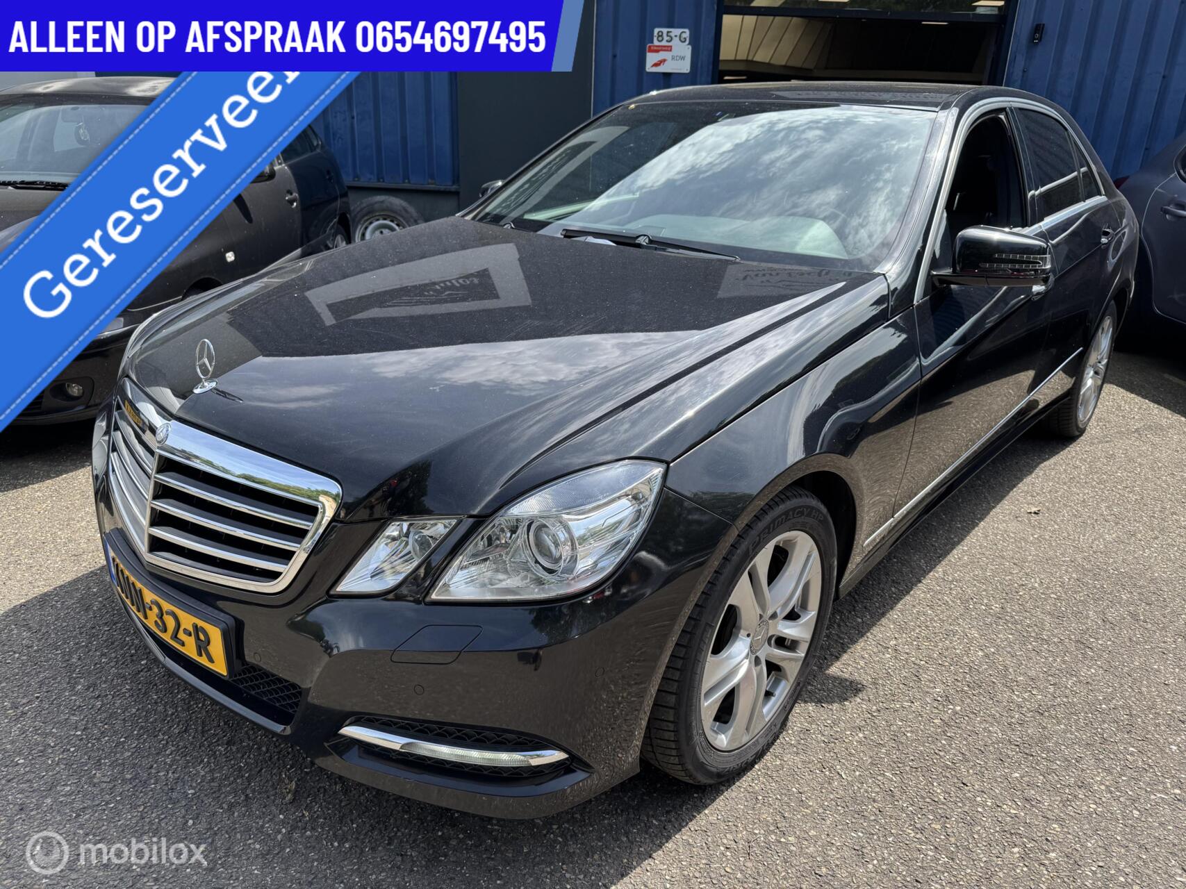 Mercedes-Benz E 350 4Matic 350 CGI 306PK Avantgarde  91.DKM  AUT LEDER NAVI CRUISE PDC 2012 - voorkant