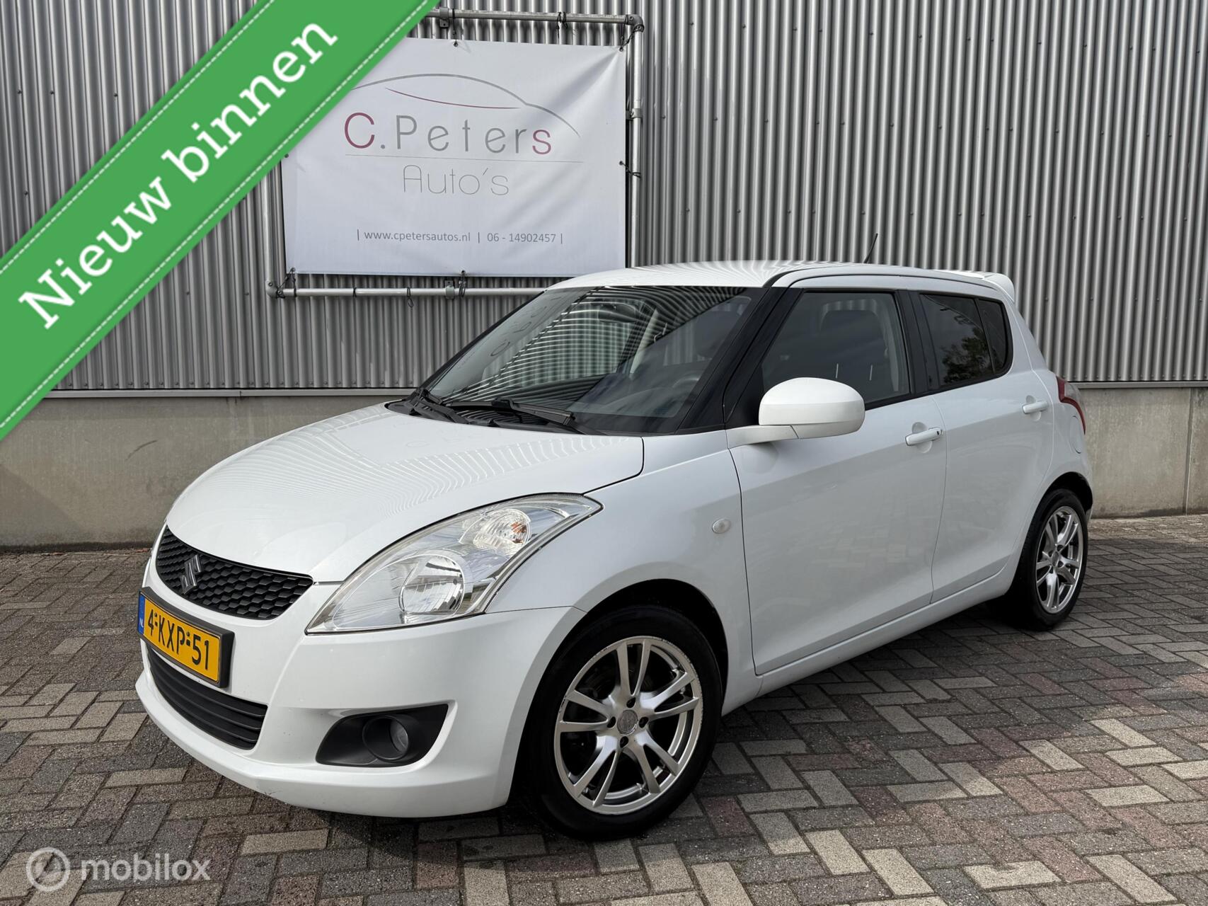 Suzuki Swift 1.2 Bandit EASSS 2013 / Climate / Cruisecontrol / Keyless / Stoelverwarming / Wit metallic NAP 2013 - voorkant