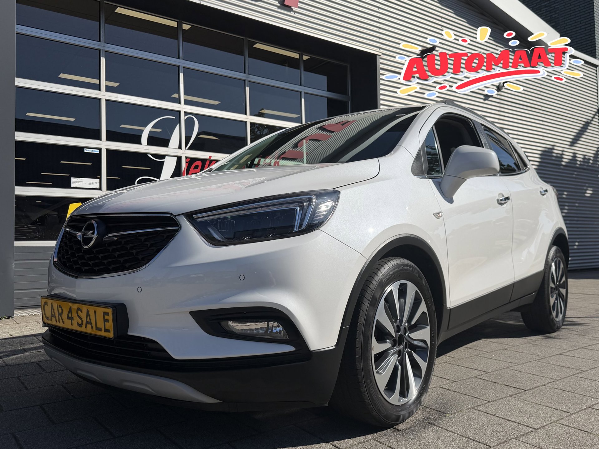 Opel Mokka X 1.4 Turbo Innovation - Automaat I Navigatie I Airco I LED I Camera I 1/2 Leer I Trekhaak I Dealer onderhouden 2019 - voorkant