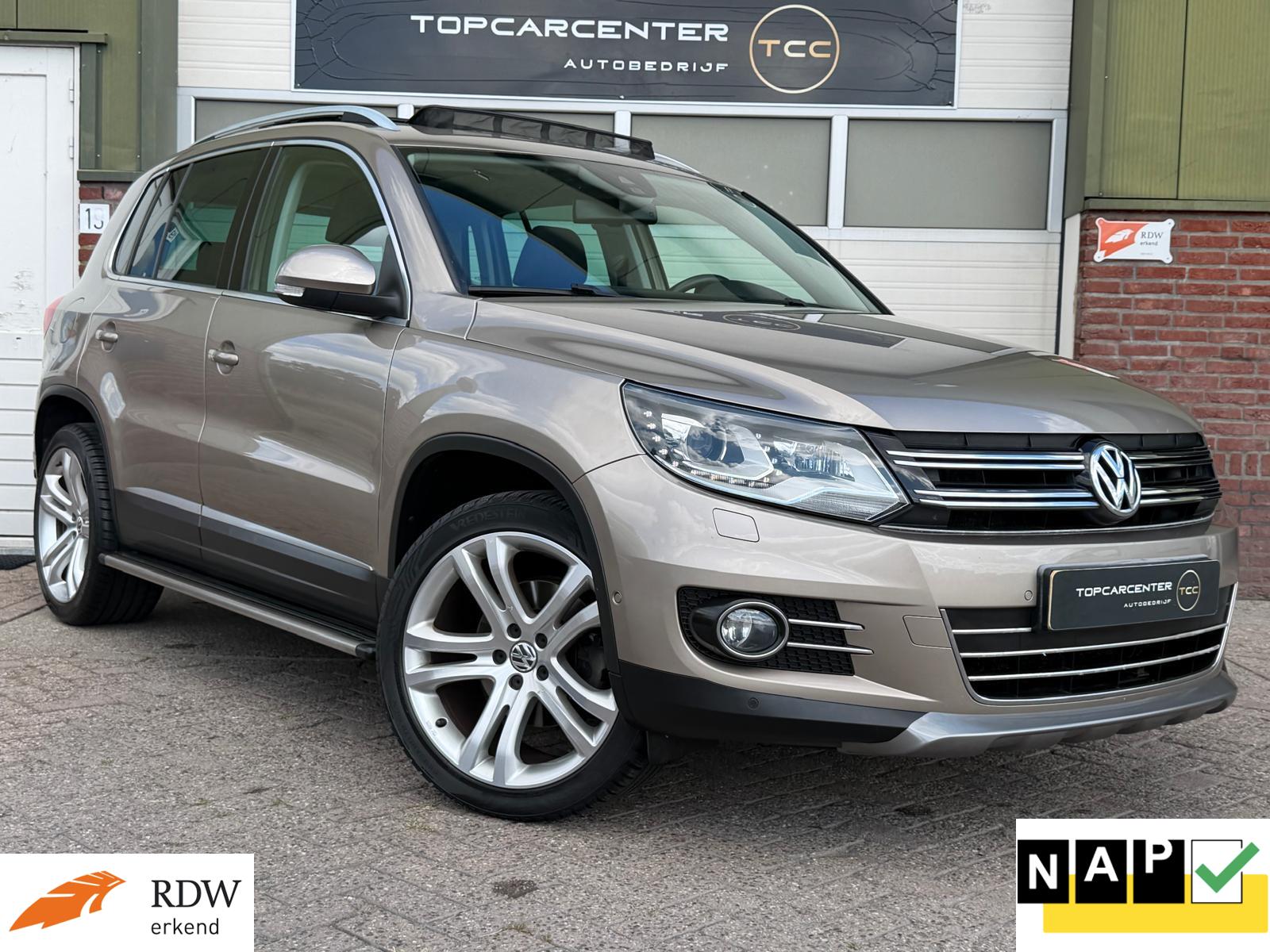 Volkswagen Tiguan 1.4TSI Sport&Style/PANO/NAVI/TREKH/APK/NAP 2012 - voorkant