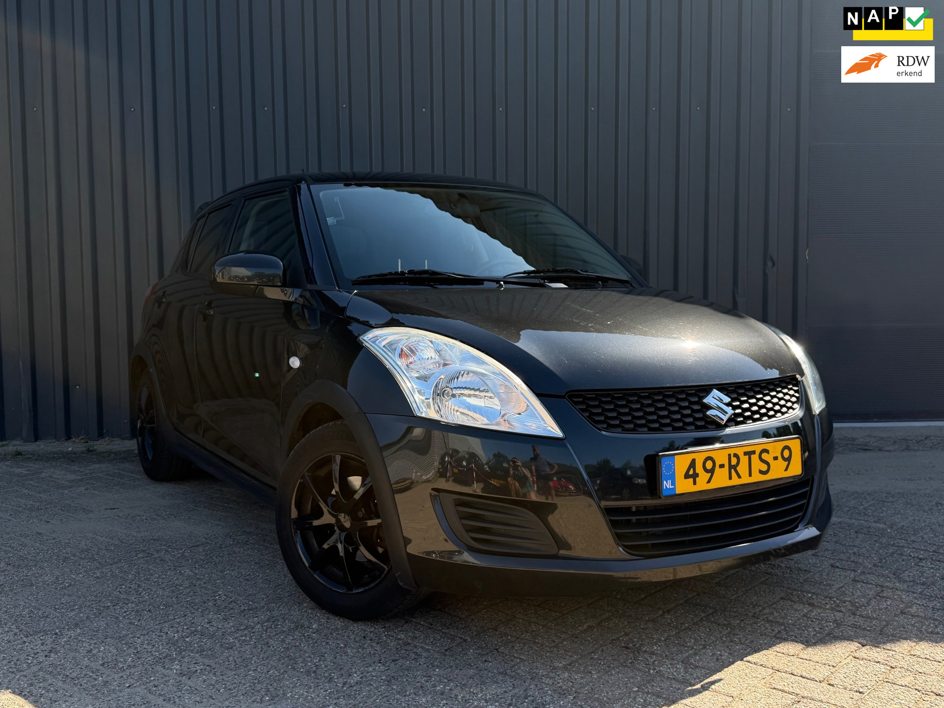 Suzuki Swift 1.2 Comfort | Airco | Stoelverwarming | Multimedia | 2011 - voorkant
