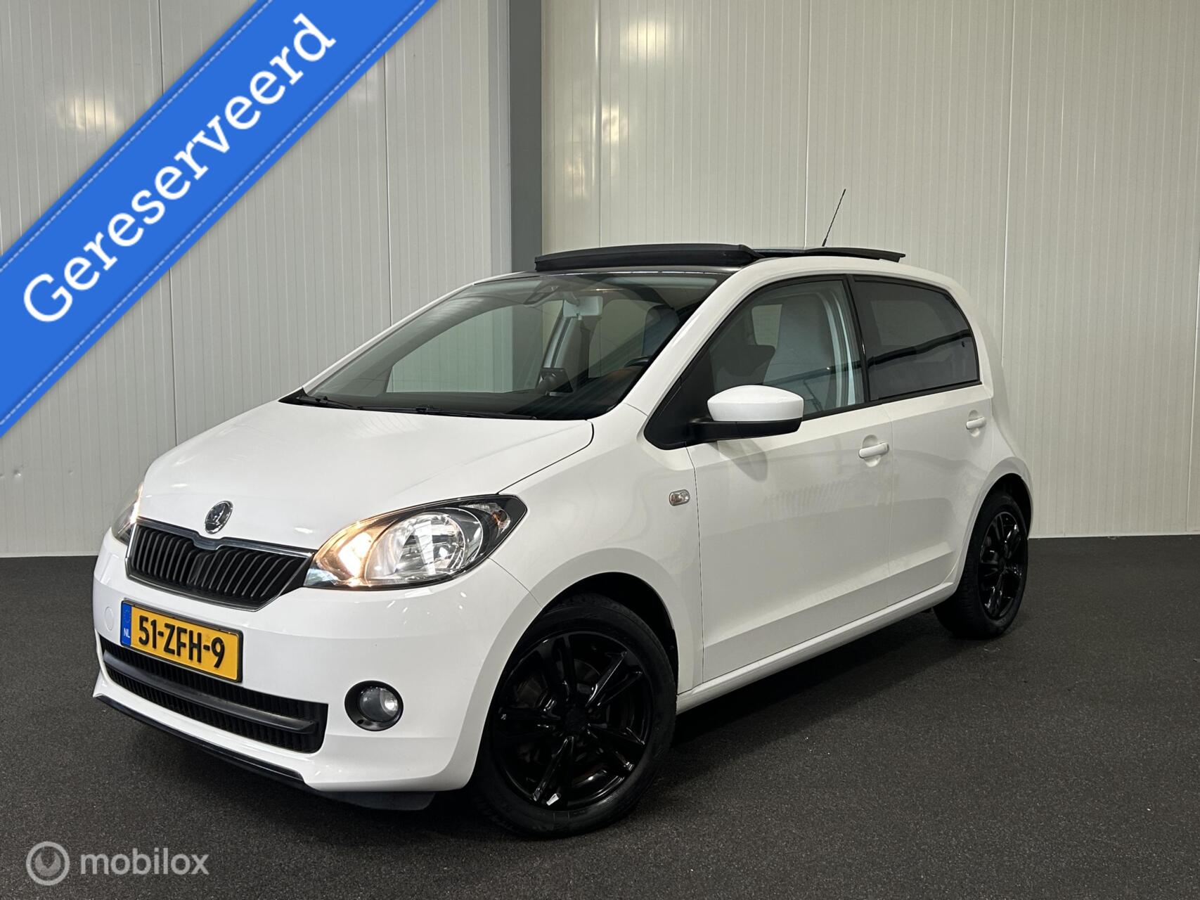 Skoda Citigo 1.0 Greentech Tour 5-drs [ NAP pano navi pdc LM ] 2012 - voorkant