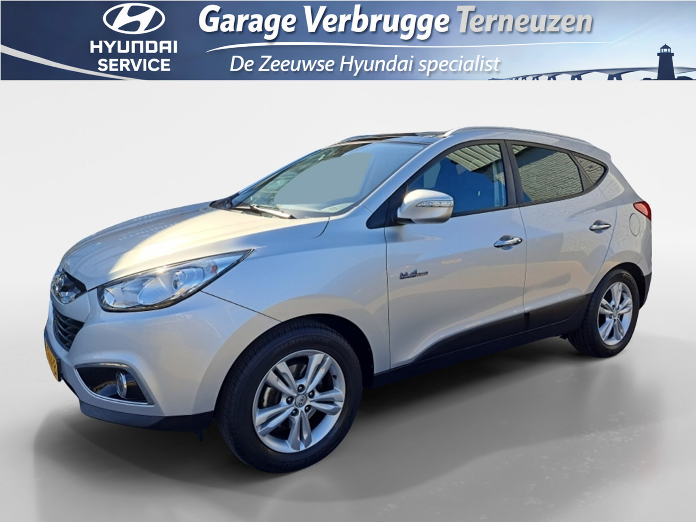 Hyundai Ix35 1.6i GDI i-Light | 1e eig. | 73.305 km | trekhaak | schuif/kanteldak | NAVI | 2012 - voorkant