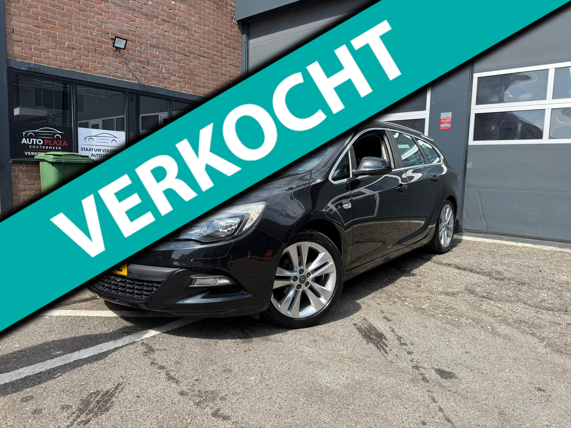 Opel Astra Sports Tourer 1.4 Turbo Sport 2012 - voorkant