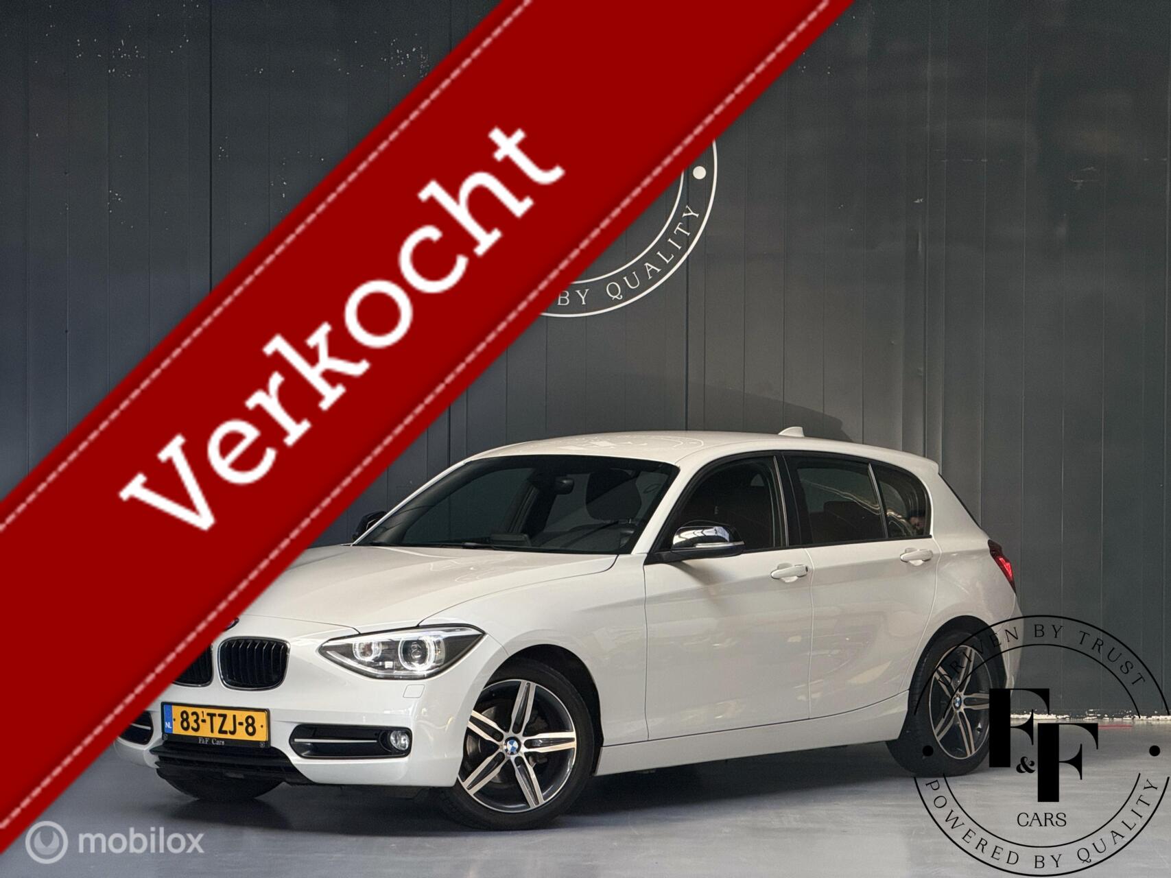 BMW 1er Reihe 116i Sport Line|Automaat |Navi|Xenon|Cruise|NAP 2012 - voorkant