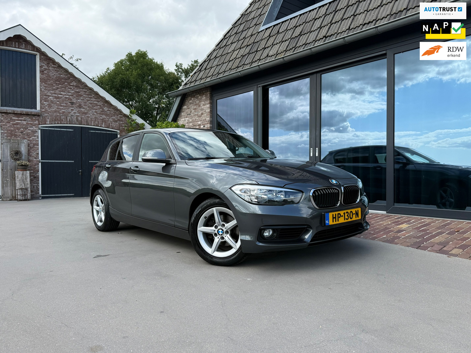 BMW 118i 118i Automaat EDE Corporate Lease Essential 2015 - voorkant