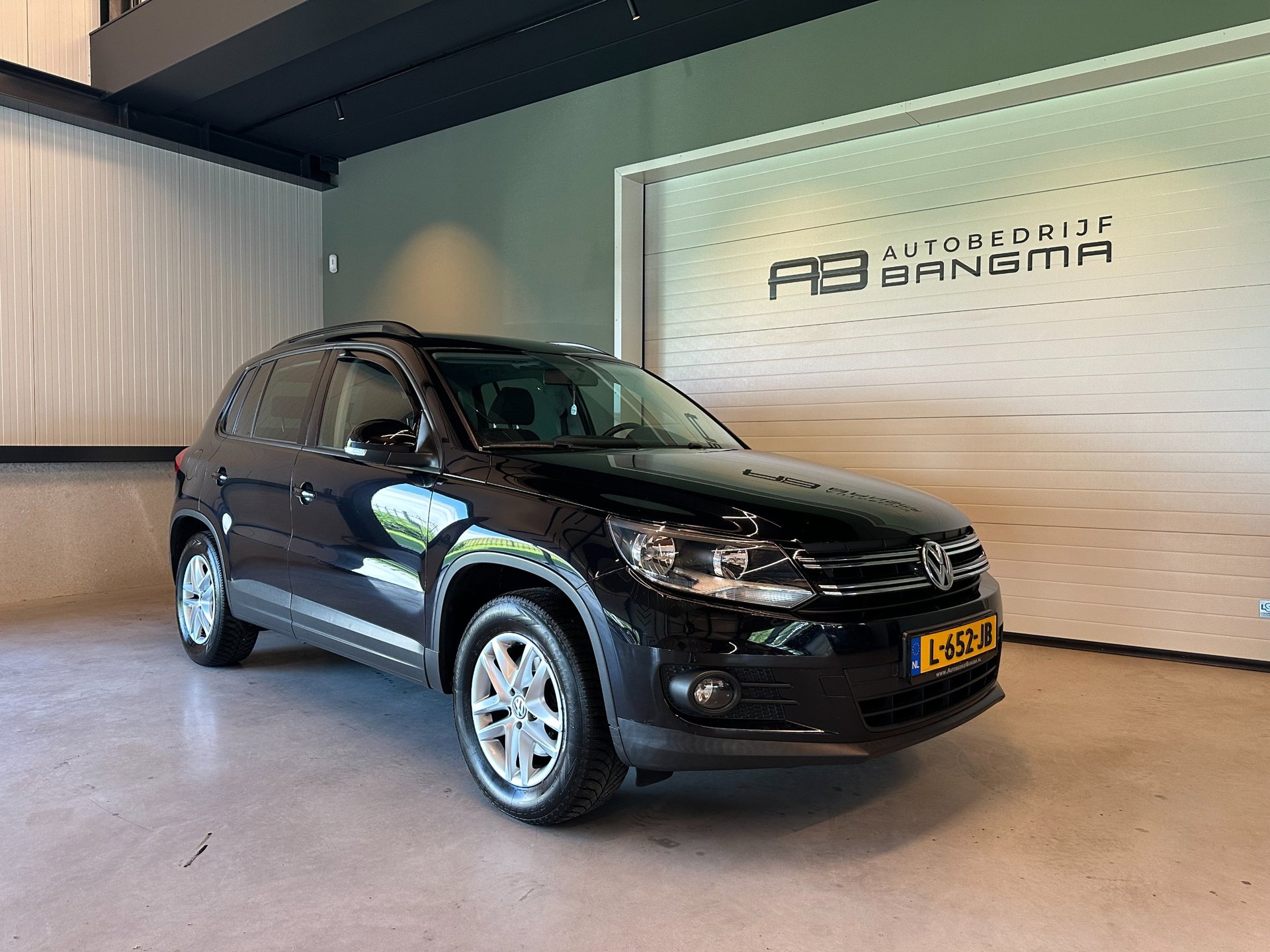 Volkswagen Tiguan 1.4 TSI SPORT&STYLE-uitv|CLIMA AIRCO|CRUISE CONTROL|LM-VELG|STOELVERWARMING|TREKHAAK|APK+OH-BEURT BIJ AFLEVERING 2013 - voorkant