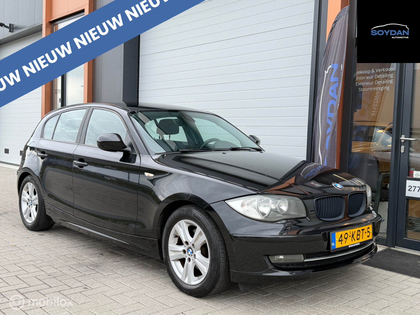 BMW 1er Reihe 118i Business Line Style |CRUISE | NAP | 5 DRS | 2009 - voorkant