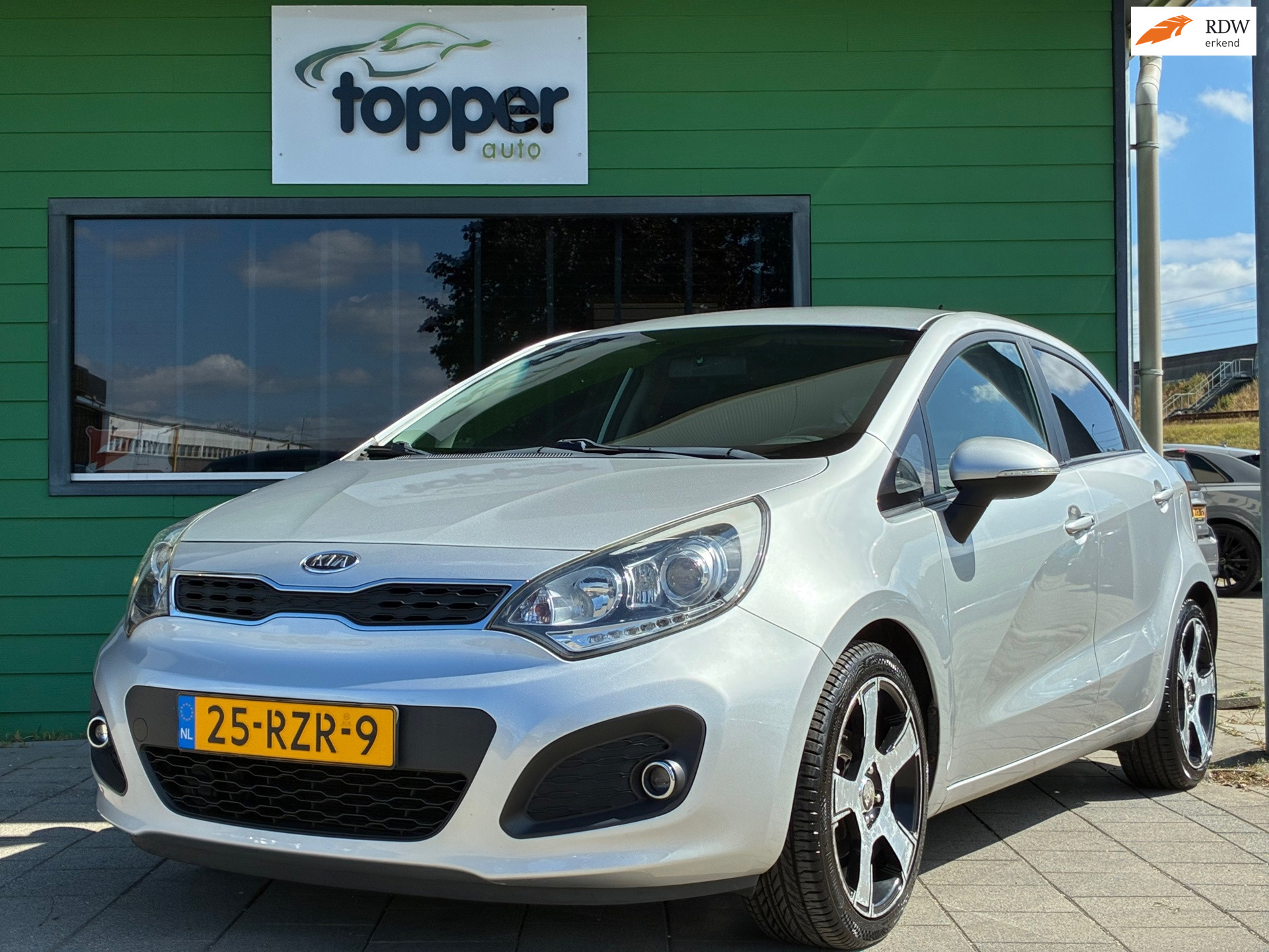 Kia Rio 1.2 CVVT Super Pack|CruiseControl|Climatronic|PDC|Elektr.ramen|Nieuwe APK| 2011 - voorkant