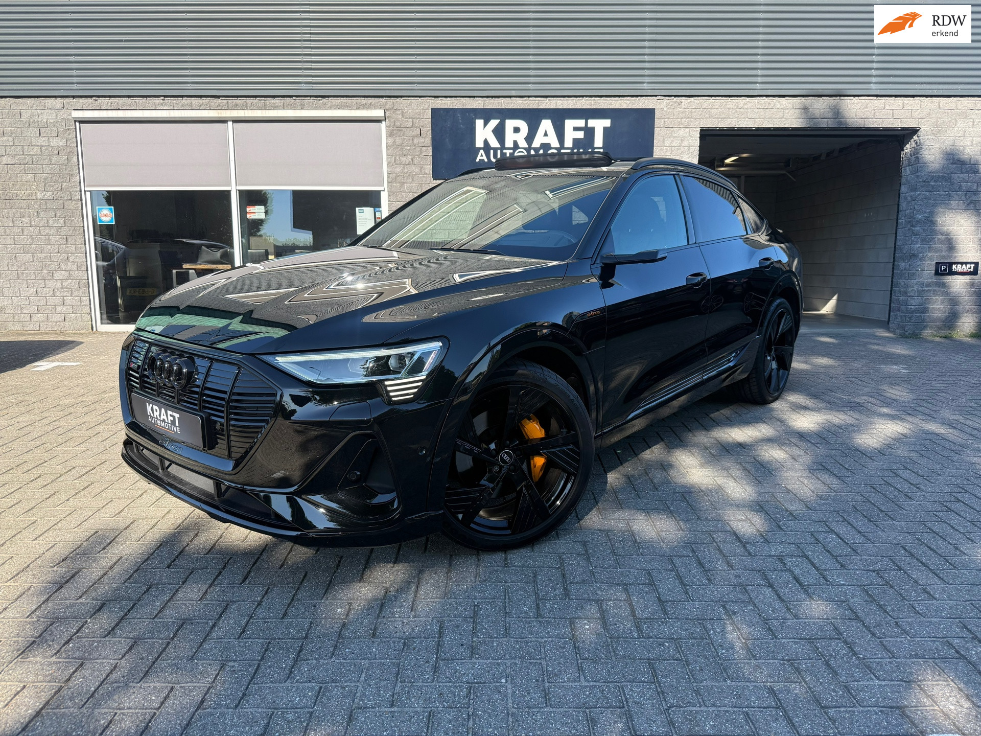 Audi E-tron Sportback 55 55 quattro S-Line 95 kWh | Black Edition | Full option | PANO | 408PK! | Matrix LED | B&O | Memory | 360° | 2021 - voorkant