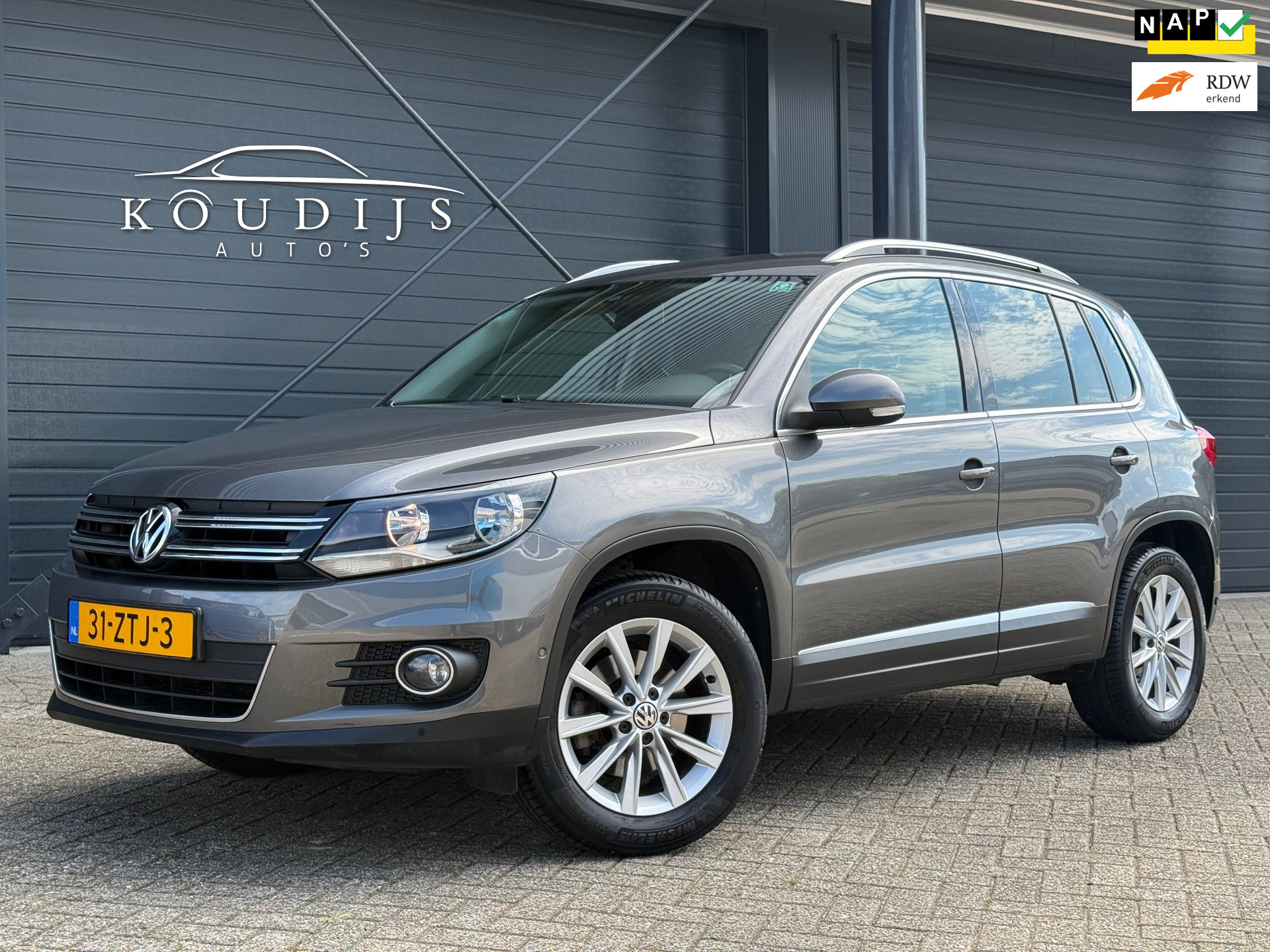 Volkswagen Tiguan 1.4 TSI Sport&Style, Parkeerhulp, Cruise, Climate, Bluetooth, Trekhaak, NL auto 2013 - voorkant