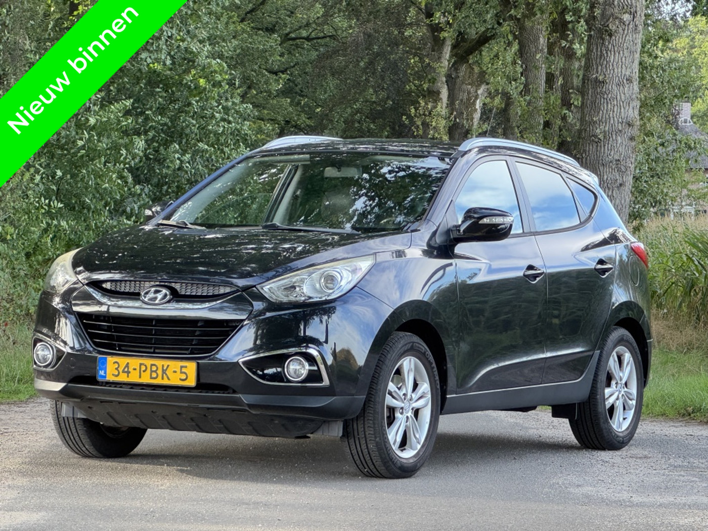 Hyundai Ix35 2.0i 4WD Business Ed 2de eigenaar goed ond 2011 - voorkant