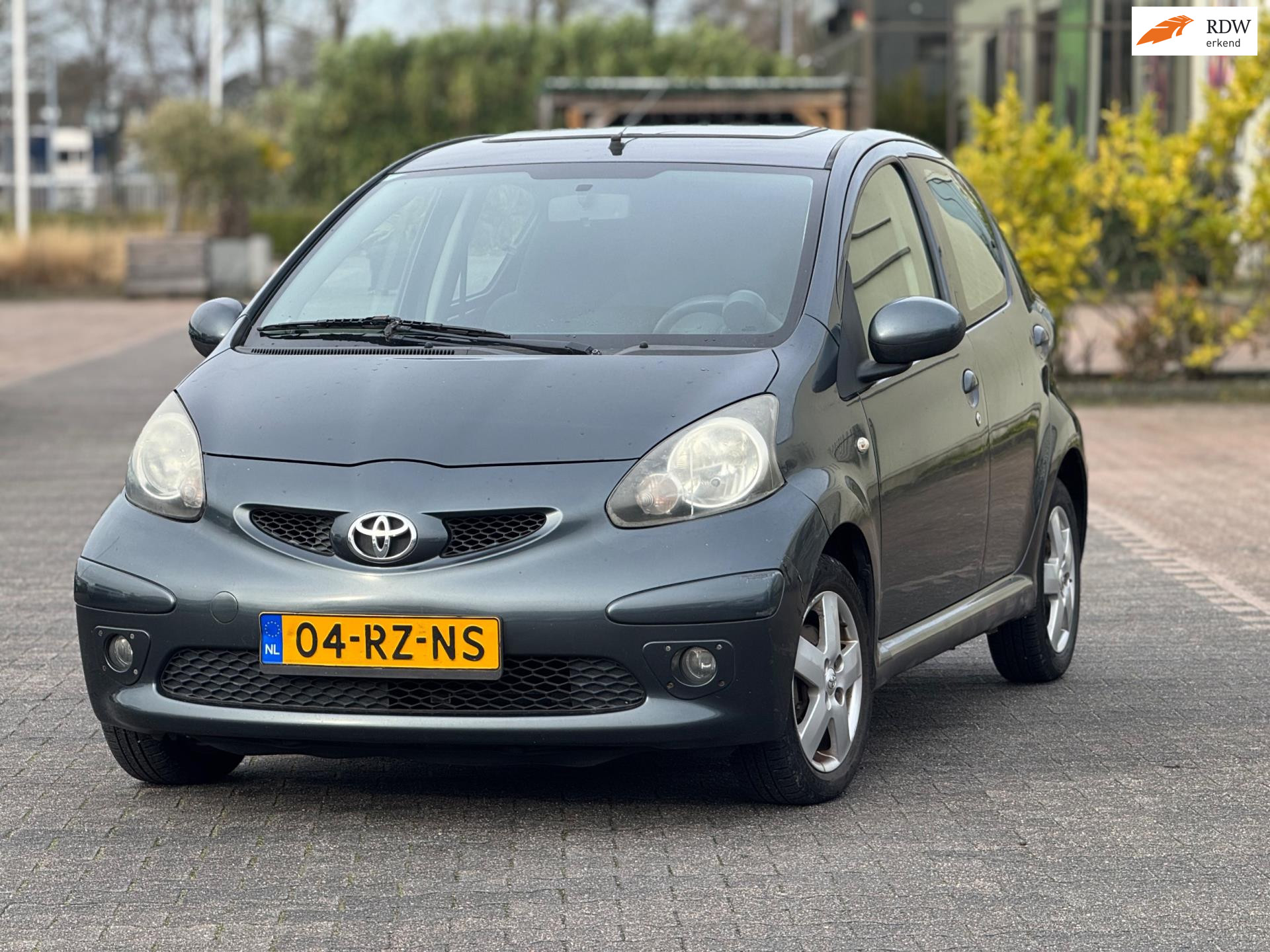Toyota Toyota Aygo 1.0-12V Sport | Airco | Schuifdak | 4 Deuren | Toerenteller 2005 - voorkant