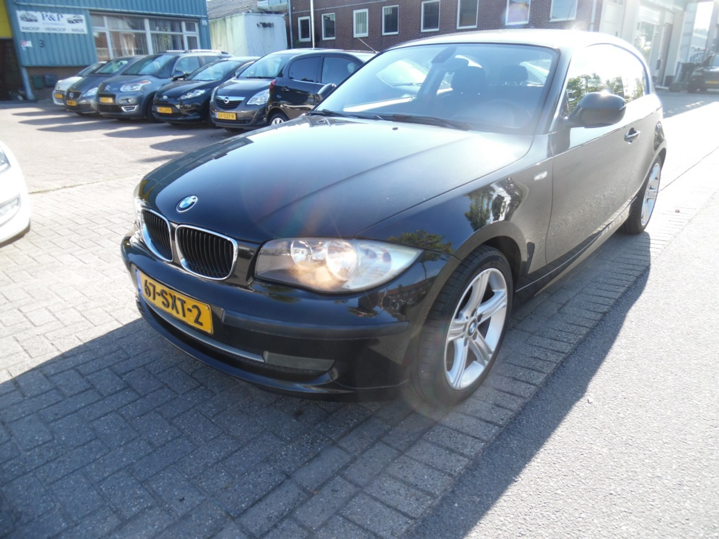 BMW 1er Reihe 118i Business Line  airco 2011 - voorkant