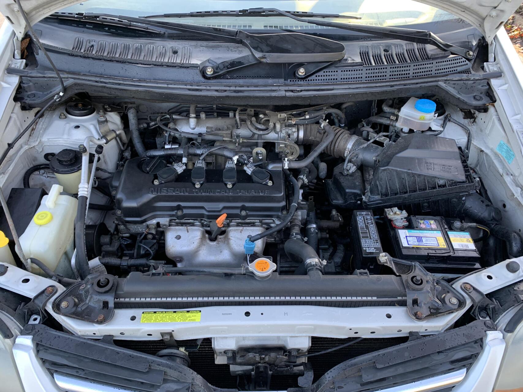 Foto van Nissan Almera Tino