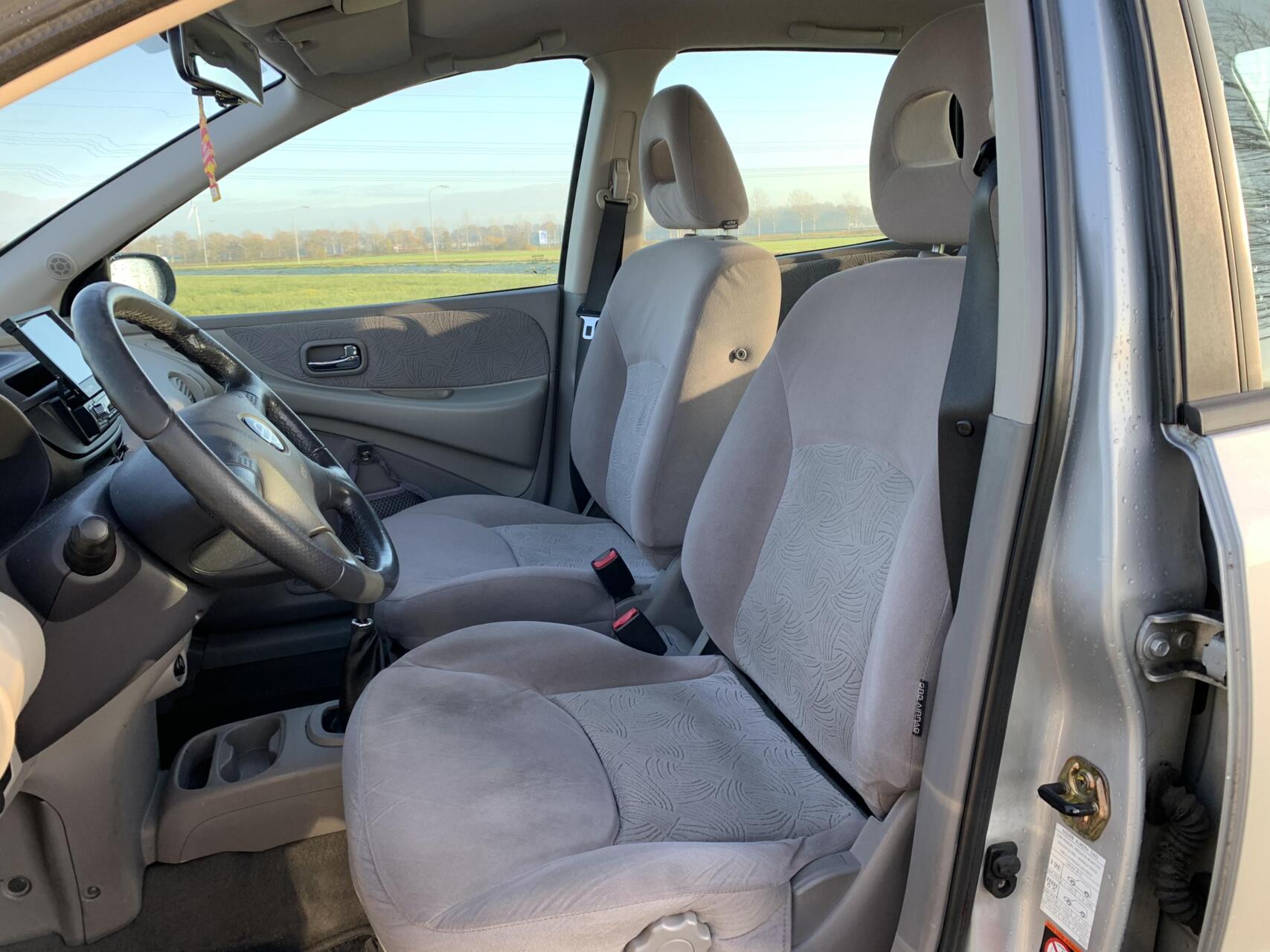 Foto van Nissan Almera Tino