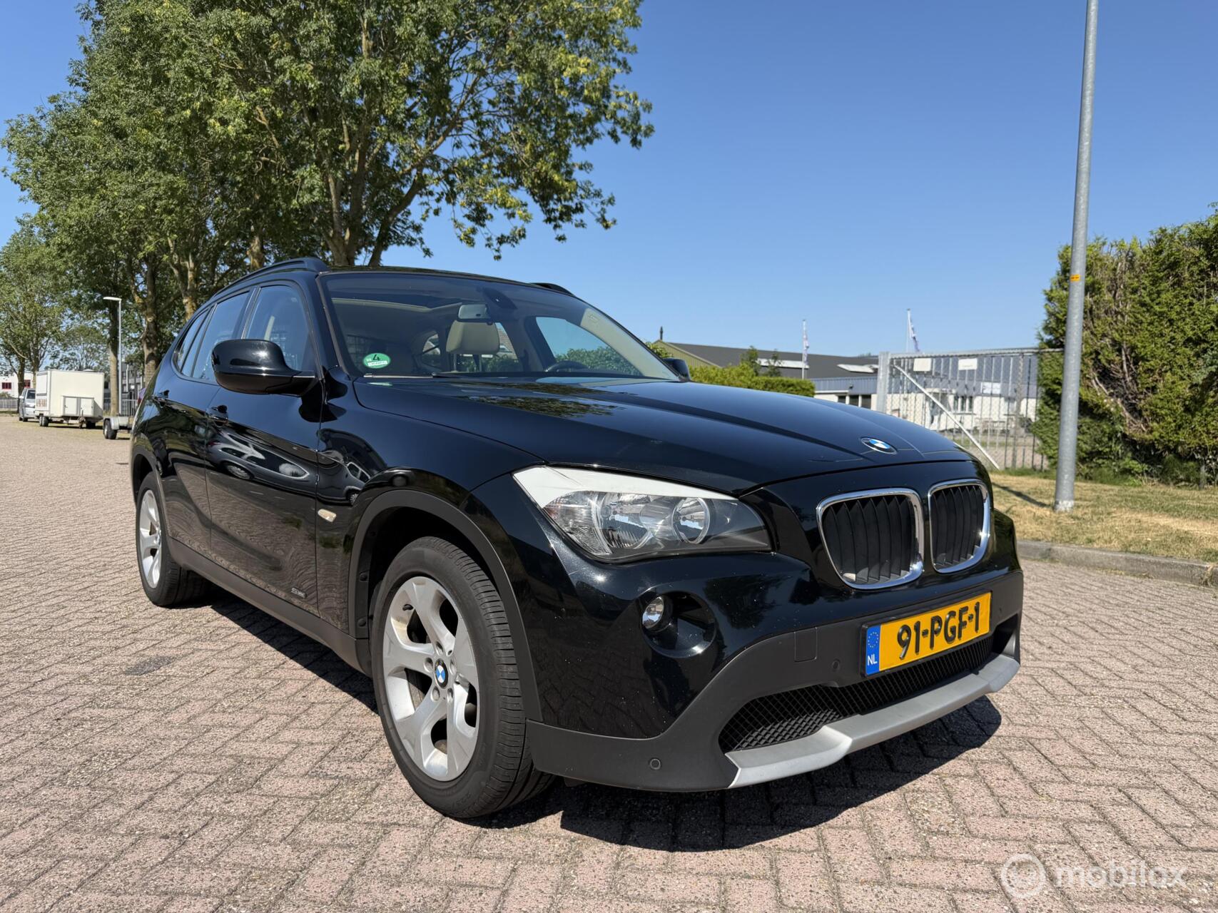 BMW X1 sDrive 18i sDrive18i Executive Eerste Eigenaar Vol Opties 2011 - voorkant