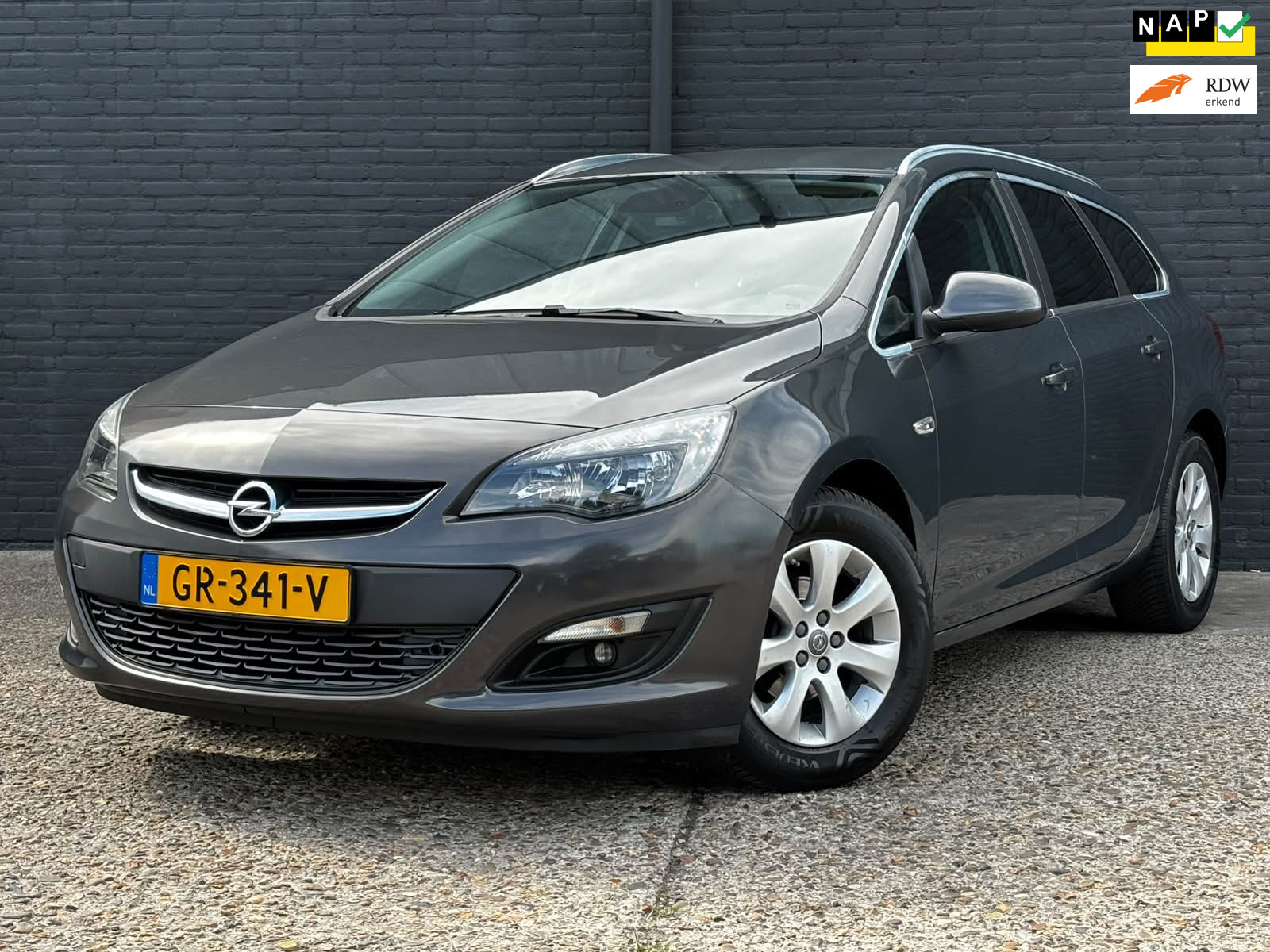 Opel Astra Sports Tourer 1.4 Turbo Edition TREKHAAK|NAVI|PDC|CRUISE|NWE APK 2015 - voorkant