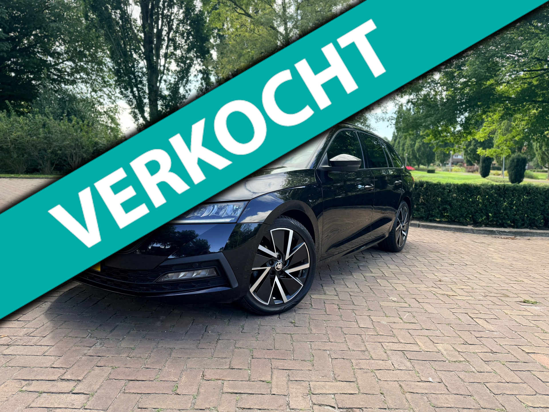 Skoda Octavia 1.0 e-TSI Sport Business | DSG | CarPlay | Trekhaak | Luxe! 2021 - voorkant