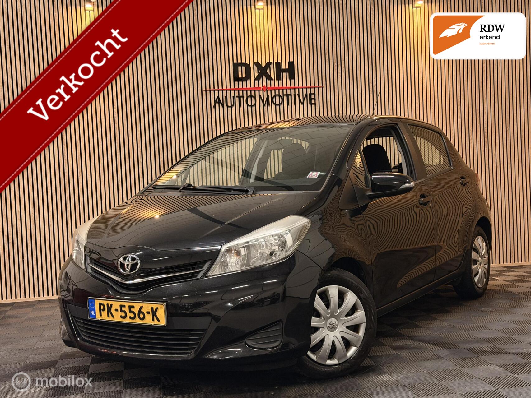 Toyota Toyota Yaris 1.3 VVT-i Aspiration NAVI BT CAMERA CRUISE AIRC 2013 - voorkant