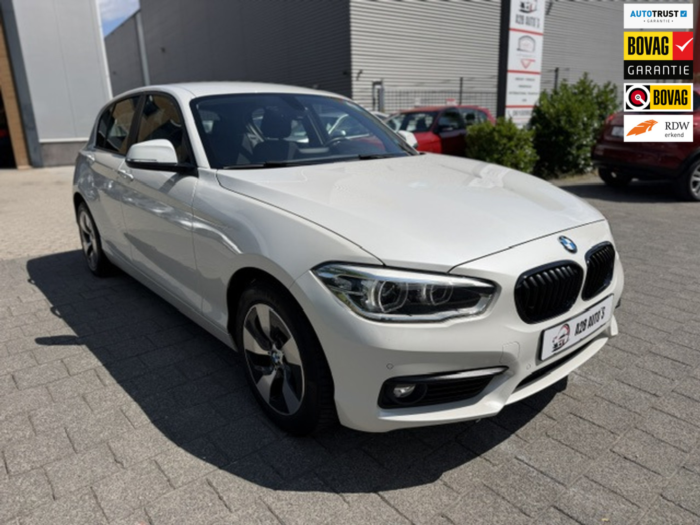 BMW 1-serie 116i|NAP|Airco|Parkeersensor|Stoelverw.|Start-stop 2016 - voorkant