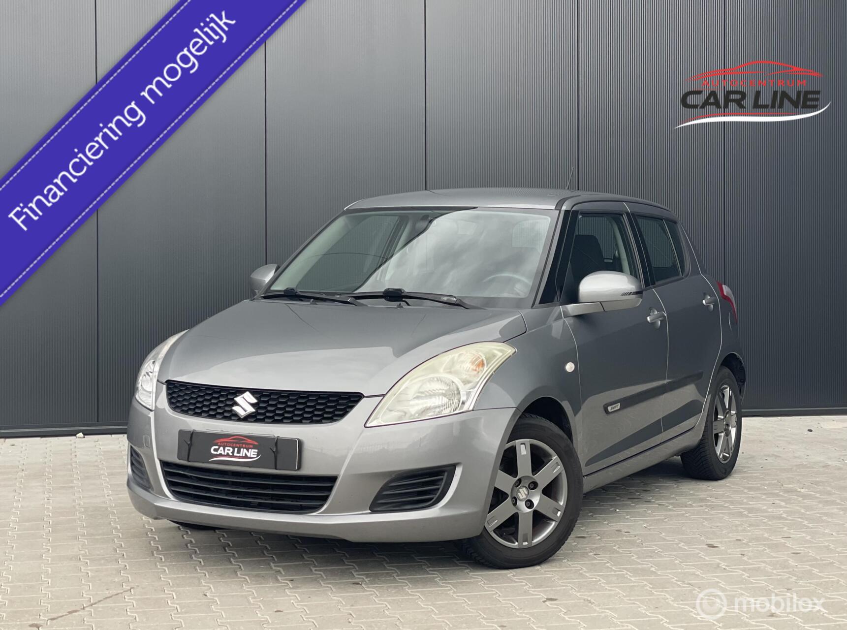 Suzuki Swift 1.2 Comfort EASSS|PDC|AIRCO|APK 2027| 2011 - voorkant