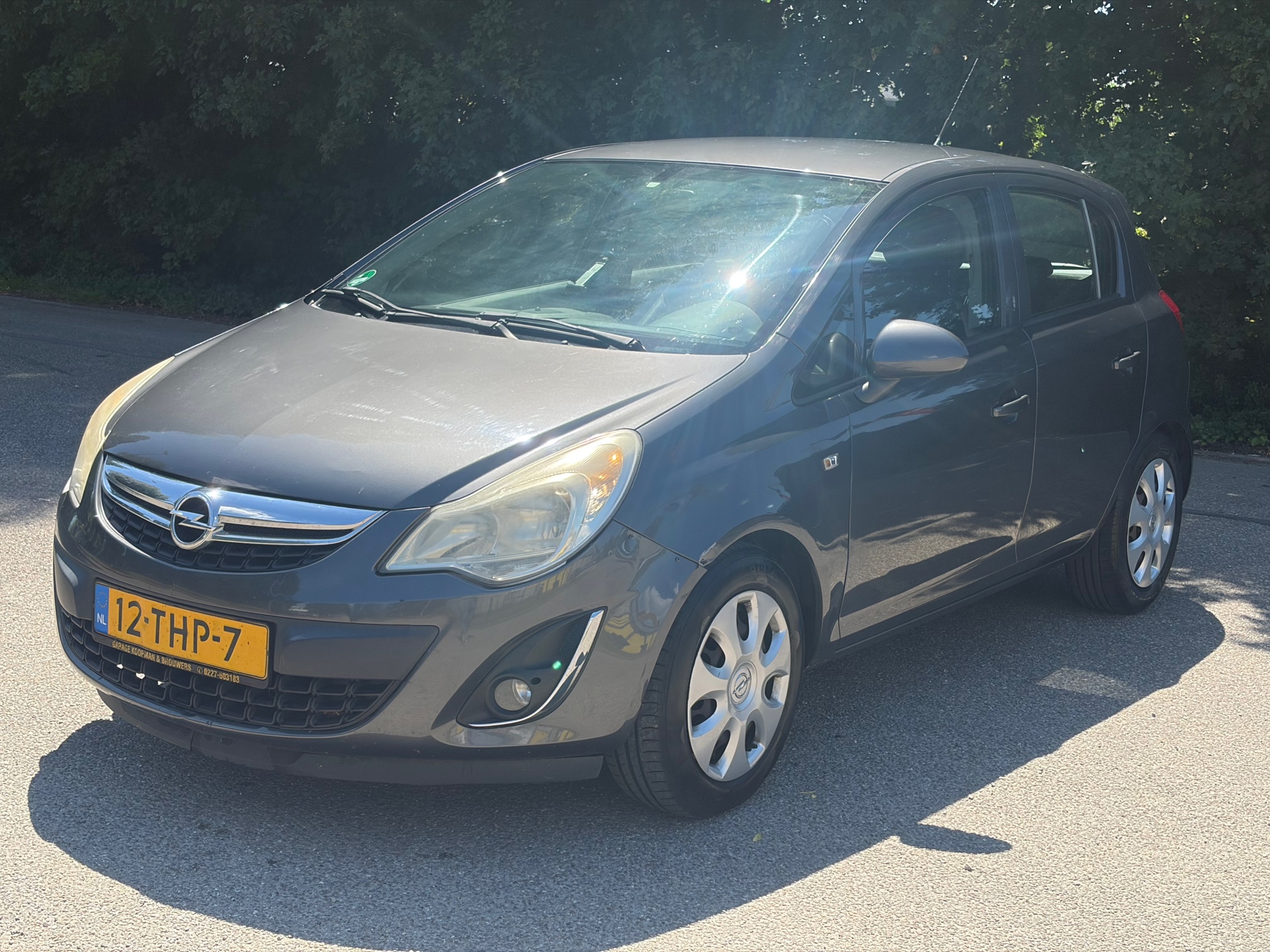 Opel Corsa 1.2-16V Anniversary Edition Airco! APK 1-2027! NAP! 2012 - voorkant