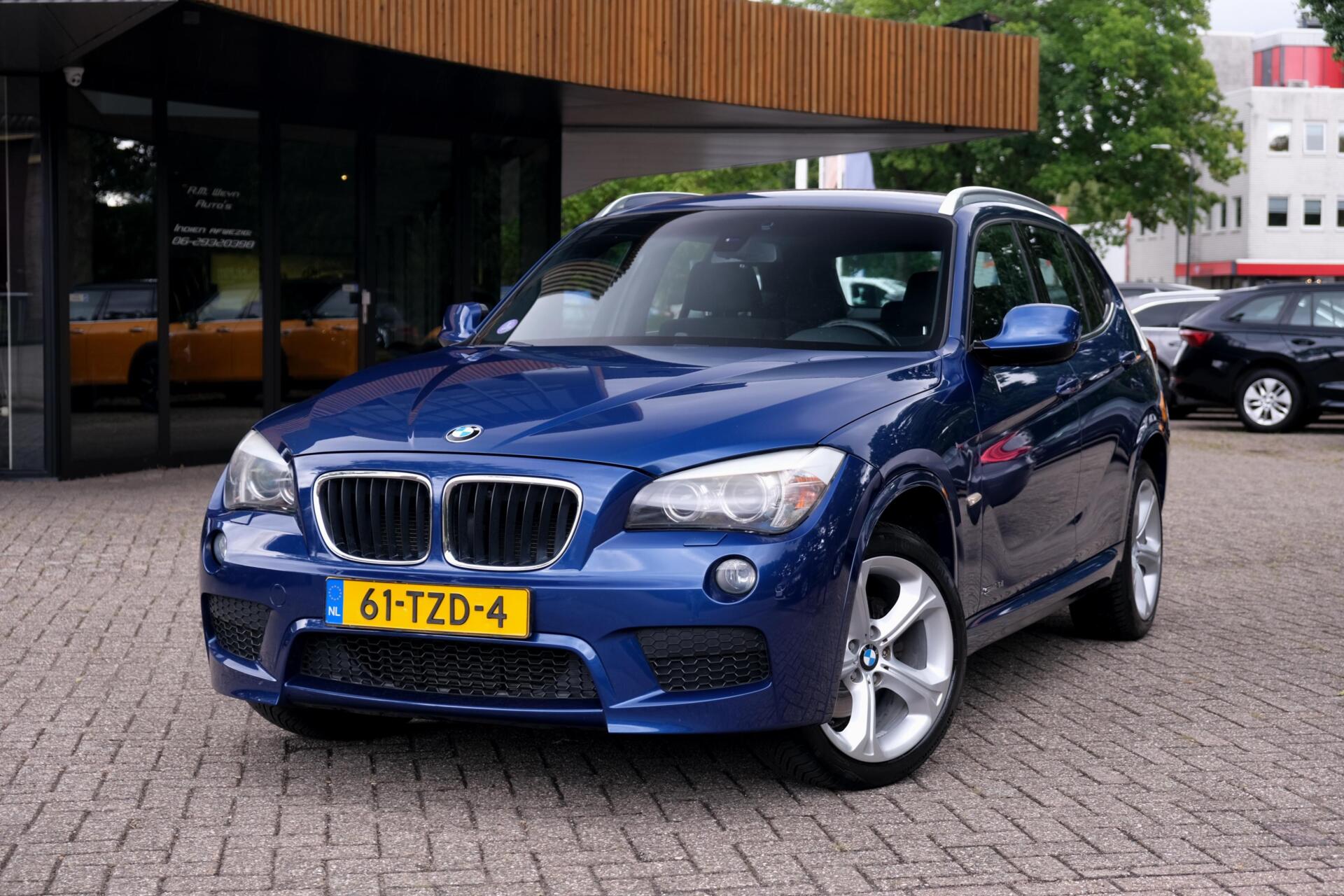 BMW X Reihe sDrive20i|Rijklaar!|LeMansblau|M-Sport|Trekhaak|Clima|Cruise|Xenon|Navi|Bluetooh 2012 - voorkant