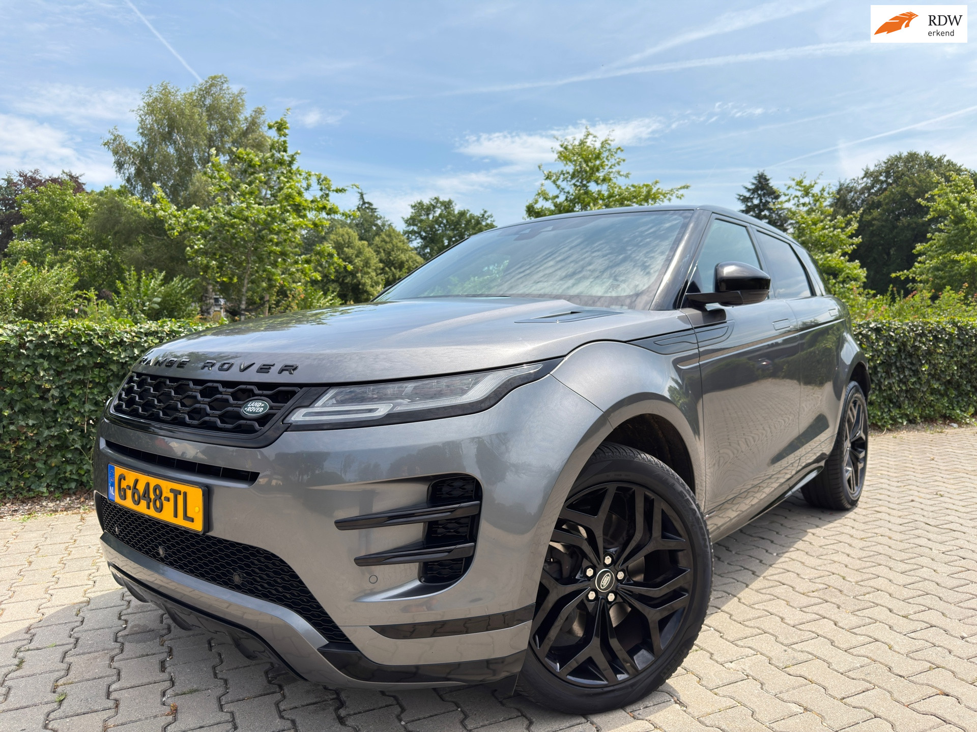 Land Rover Range Rover Evoque 2.0 P200 AWD R-Dynamic HSE Black Pack , Clima / Cruise / Camera-Navi-Multimedia / Leder / Led / 20" 2019 - voorkant