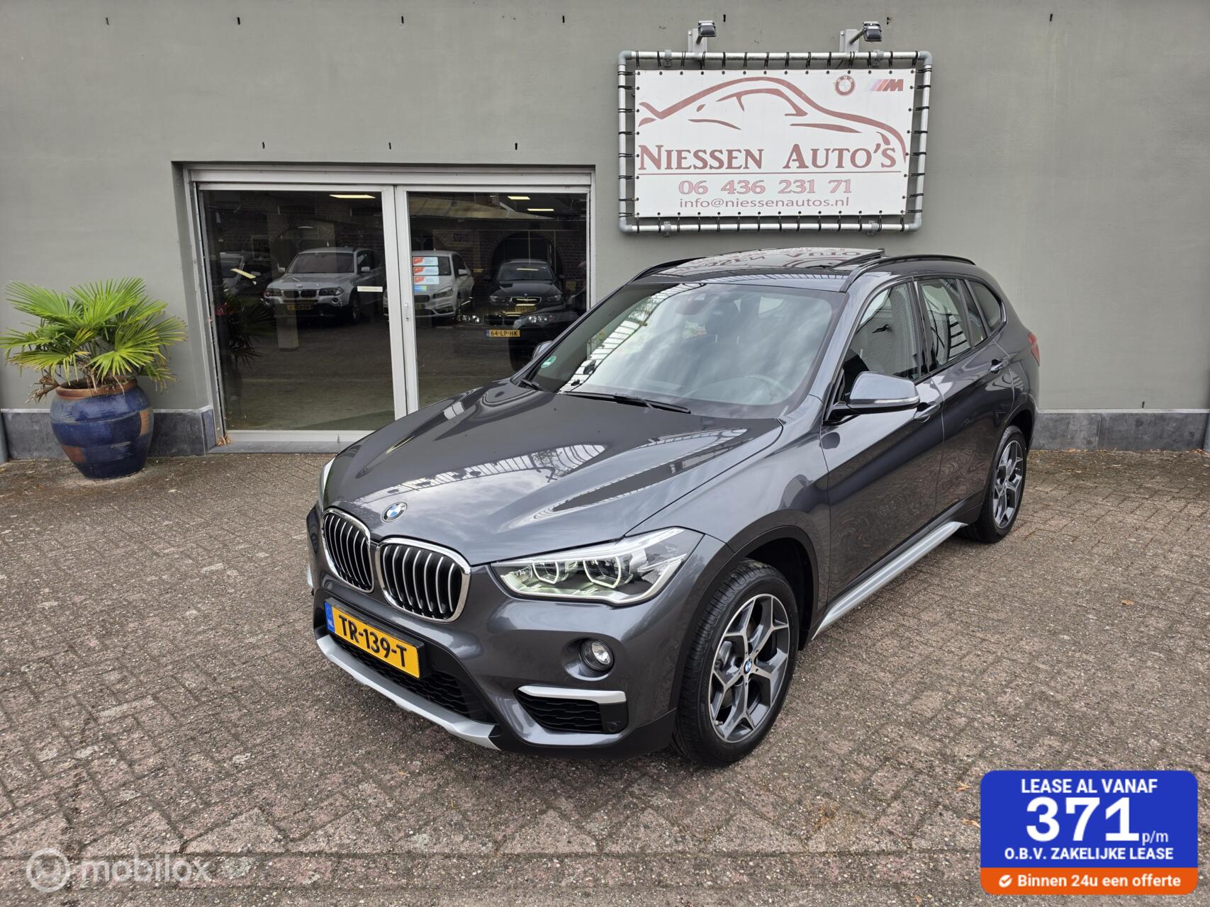 BMW X1 Sdrive20i sDrive20i Orange Edition II 2018 - voorkant