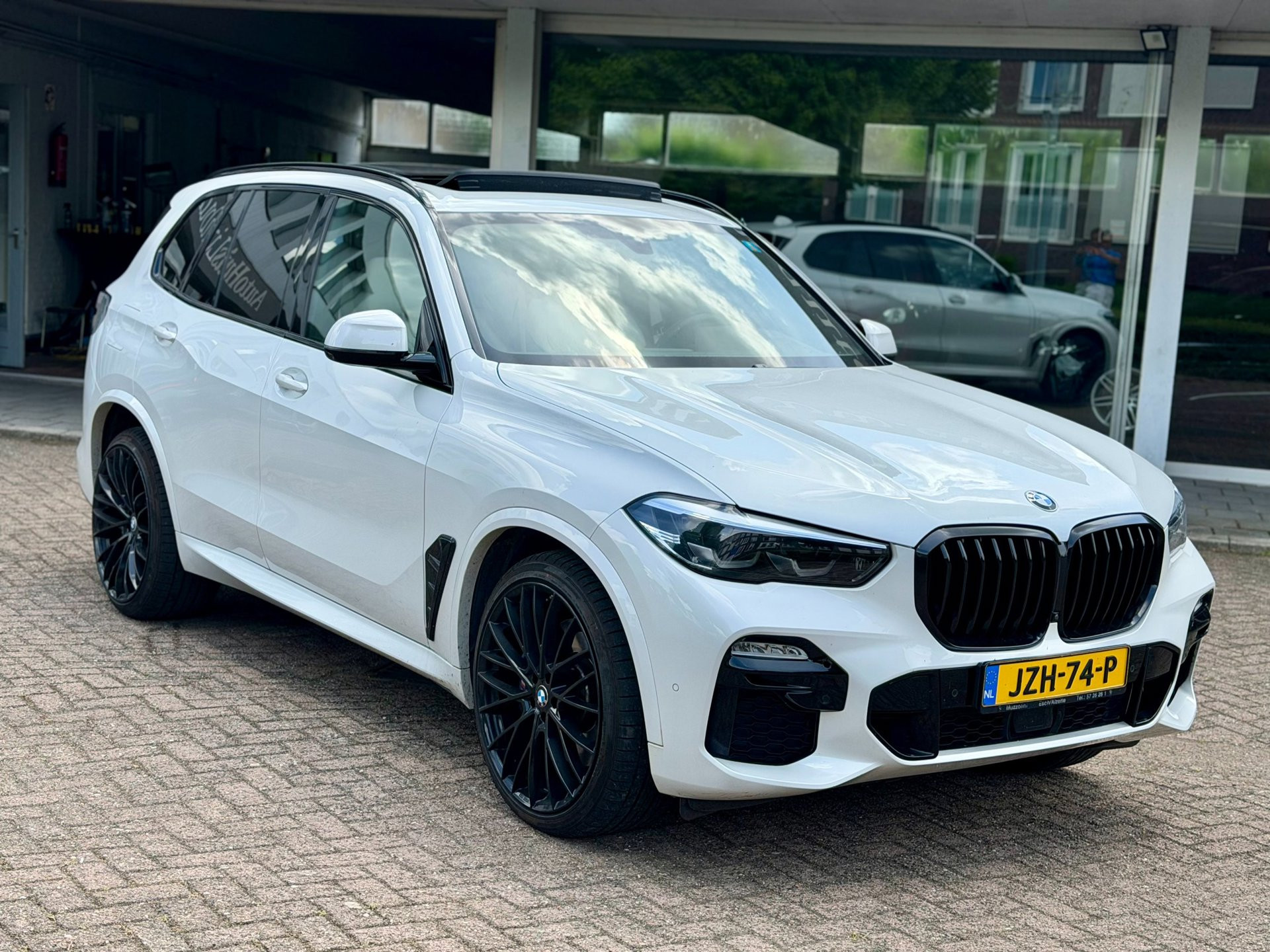 BMW X5 Xdrive45e XDrive45e High Executive|SkyLounge|Luchtvering|Wit Leer|Harman-Kardon|CarPlay|Pano|Camera 2020 - voorkant