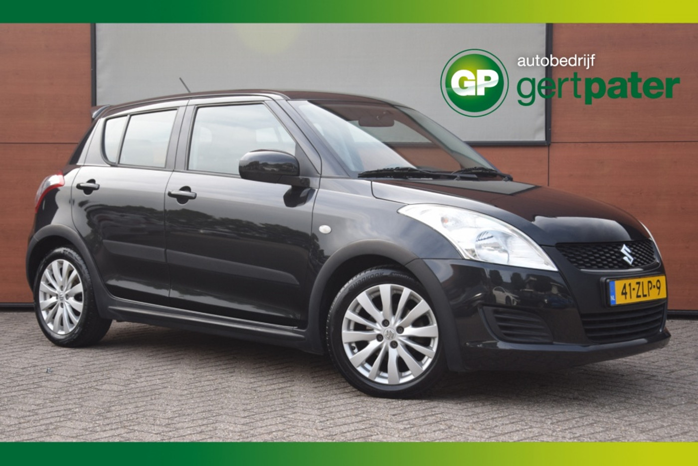 Suzuki Swift 1.2 Bandit EASSS Airco/Cruise/LM Velgen/2e eigenaar 2013 - voorkant