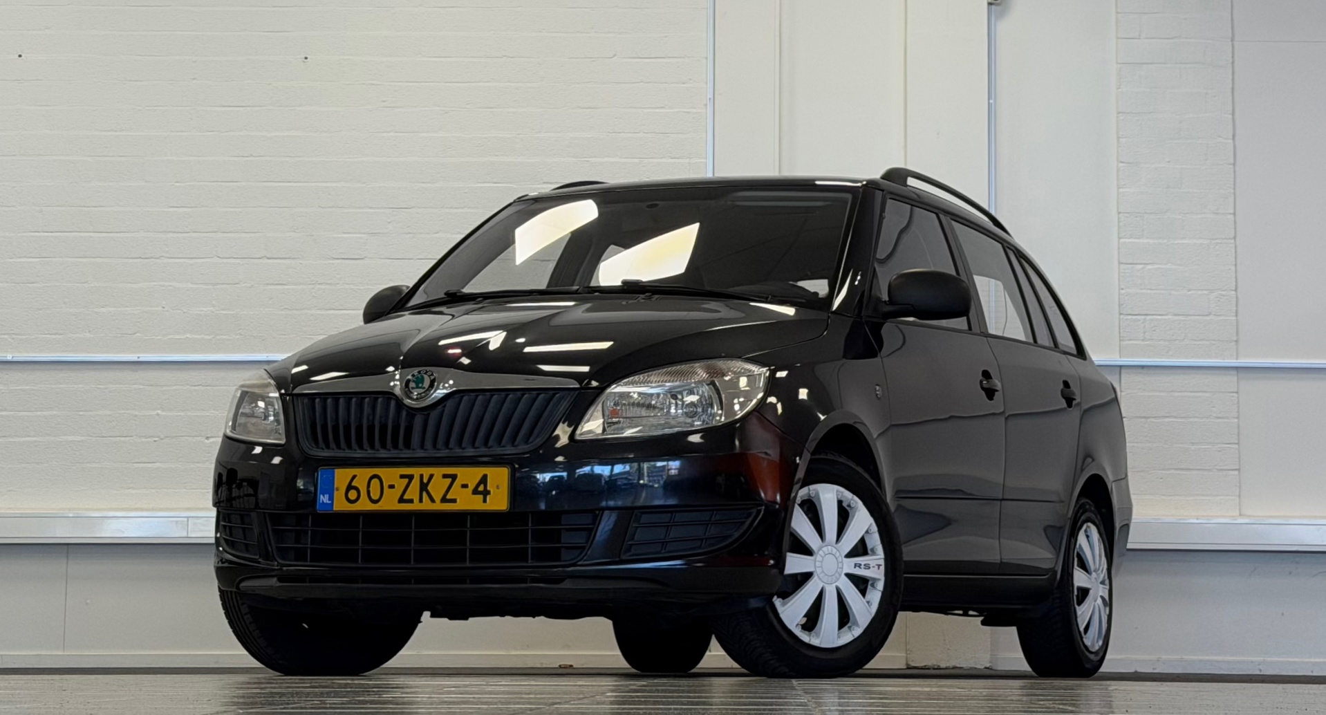 Skoda Fabia 1.2 TSI Arctic Trekhaak Airco 3e Eigenaar Nieuwe APK 2013 - voorkant